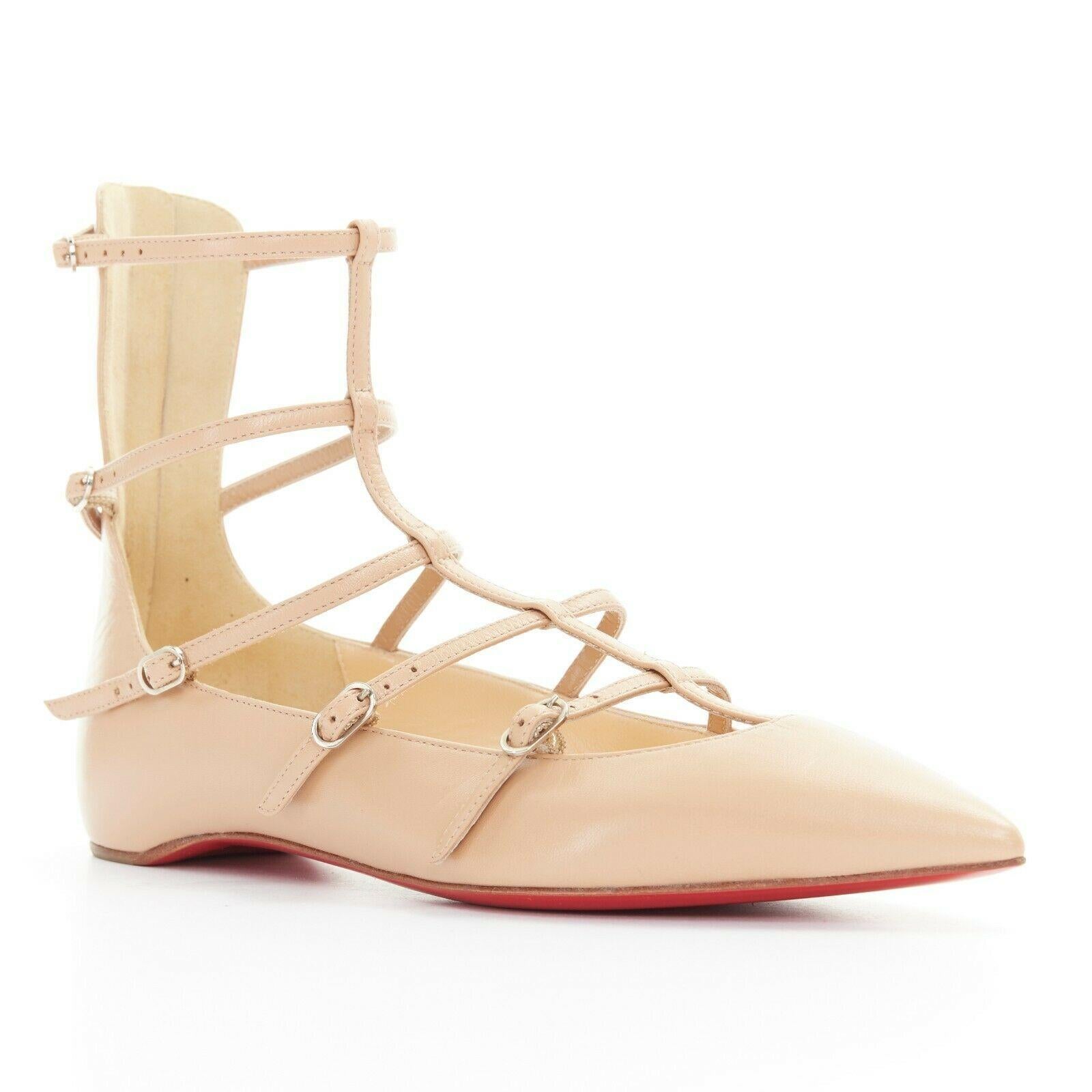 new CHRISTIAN LOUBOUTIN Toerless Muse nude point toe gladiator caged flats EU35
CHRISTIAN LOUBOUTIN
Toerless Muse. 
Nude leather upper. 
Pointed toe. 
Strappy gladiator upper. 
Gold-tone hardware. 
Buckle closure. 
Zip back closure. 
Ankle length.