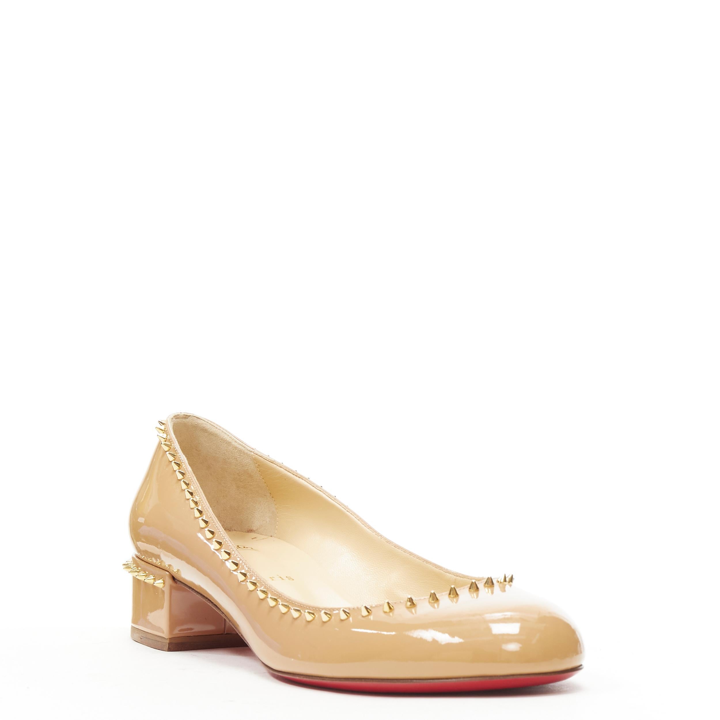 new CHRISTIAN LOUBOUTIN Trelilane 30 nude patent gold spike stud pump EU37.5 
Reference: TGAS/B01271 
Brand: Christian Louboutin 
Designer: Christian Louboutin 
Model: Trelilane 30 
Material: Patent Leather 
Color: Beige 
Pattern: Solid 
Extra