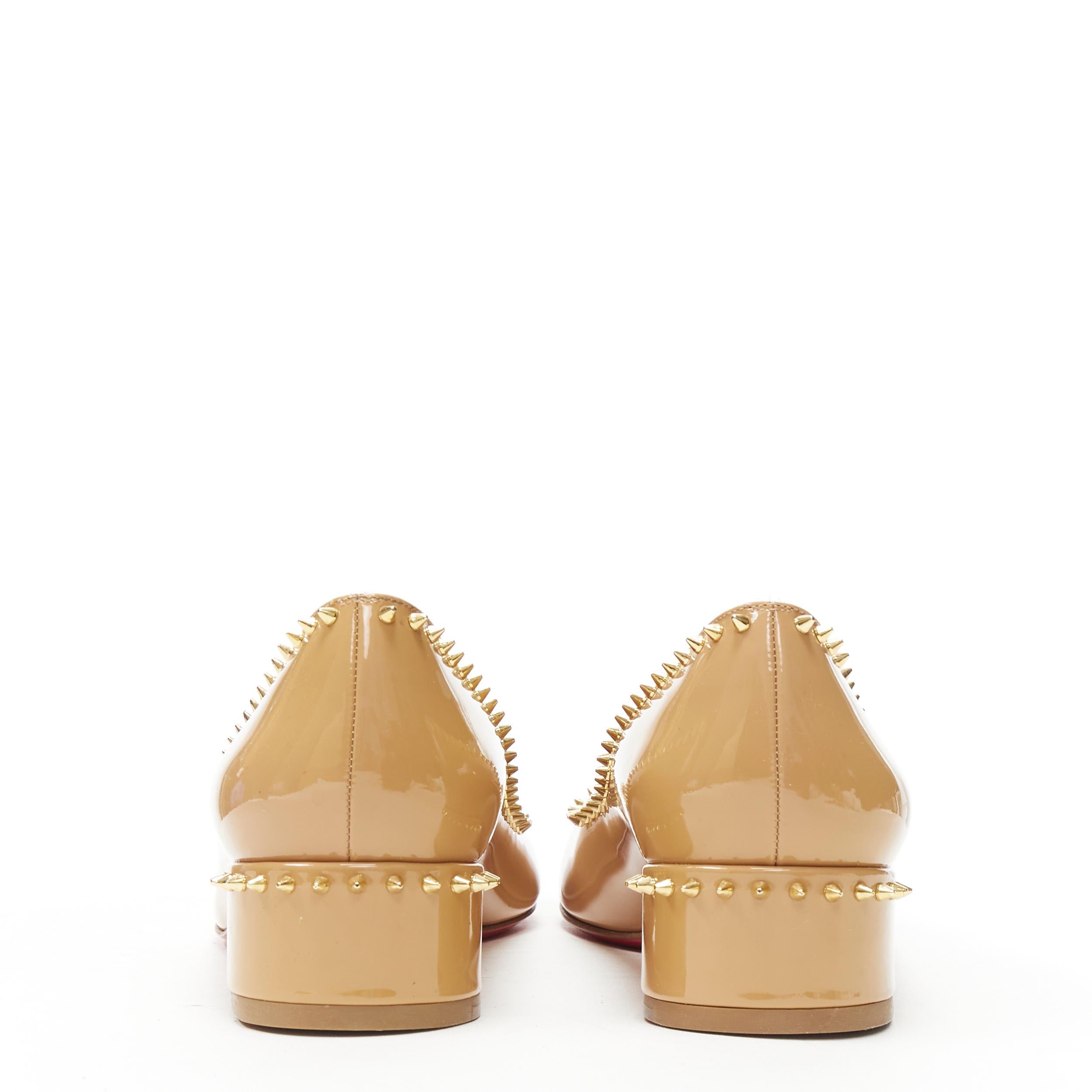 gold spiked shoes