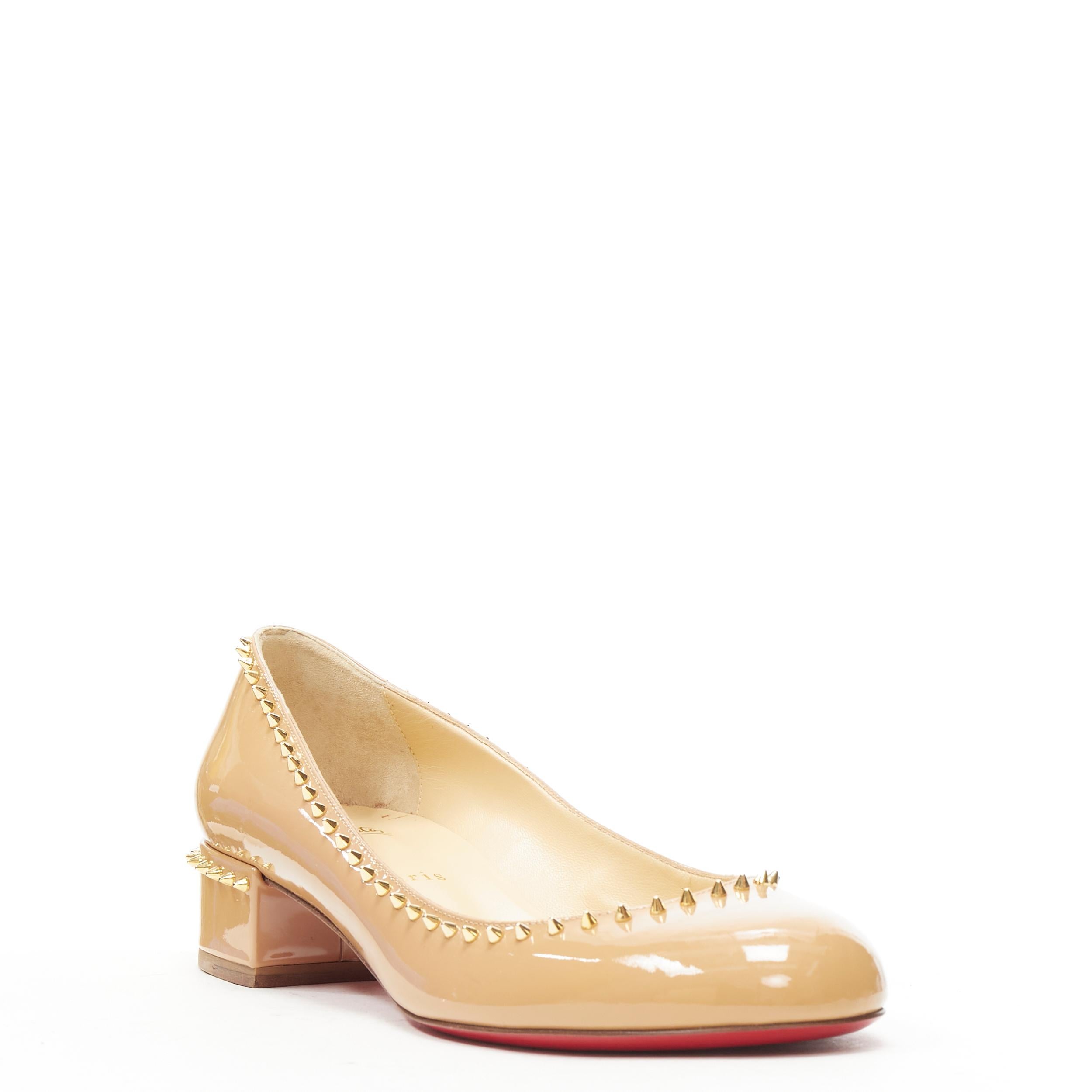 new CHRISTIAN LOUBOUTIN Treliliane nude patent gold spike stud block heel EU39 
Reference: TGAS/B01099
Brand: Christian Louboutin 
Designer: Christian Louboutin 
Model: Treliliane nude patent block 
Material: Patent Leather 
Color: Beige 
Pattern: