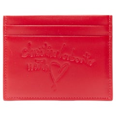 CHRISTIAN LOUBOUTIN With Love - Porte-cartes 4 cartes en cuir rouge signature emboss, neuf