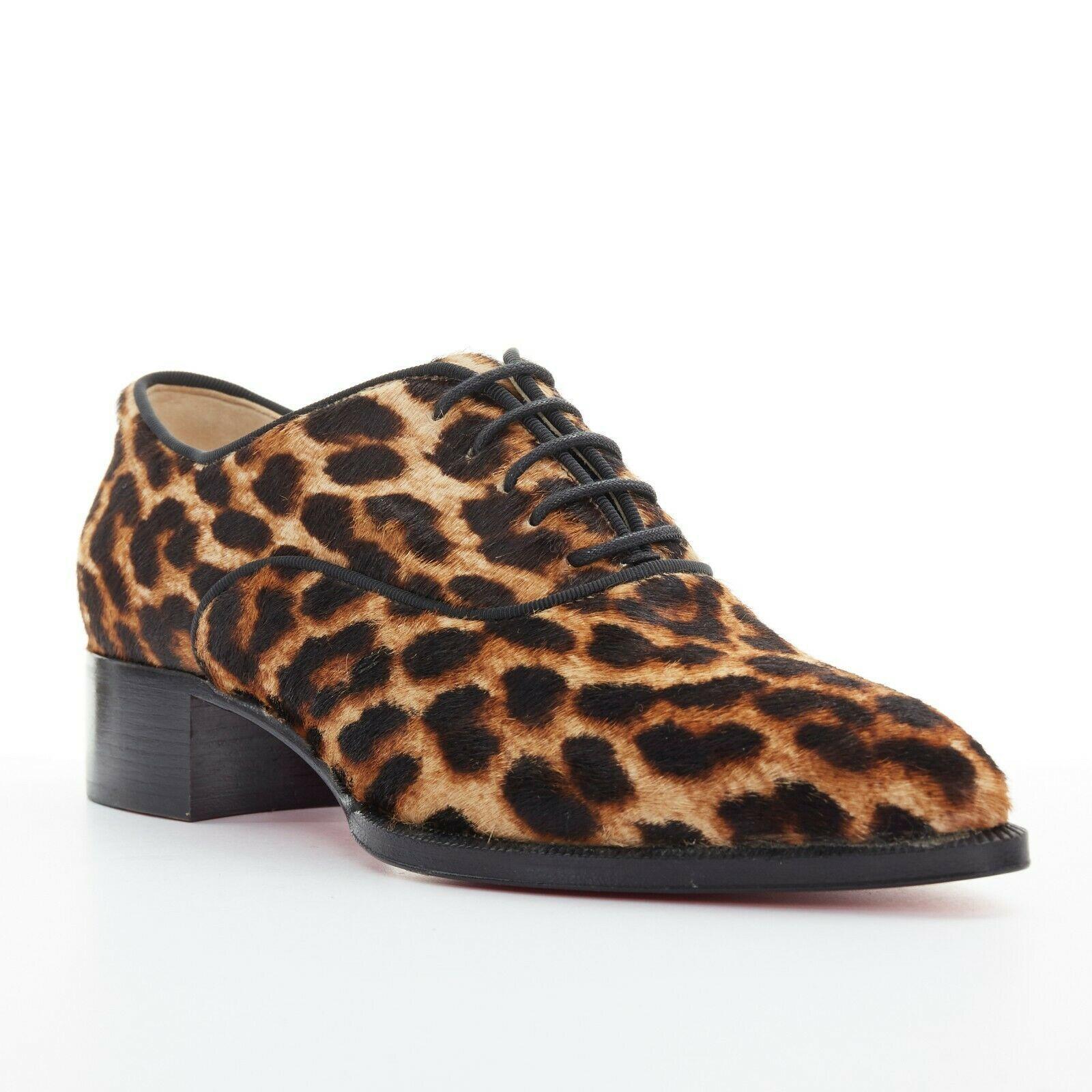 new CHRISTIAN LOUBOUTIN Zazou leopard print calfksin point toe laced brogue EU36

CHRISTIAN LOUBOUTIN
Zazou brogue. Brown leopard spot print. Calf hair leather upper. Black grosgrain piping. 4-eyelet lace front. Pointed toe. Black stacked wooden