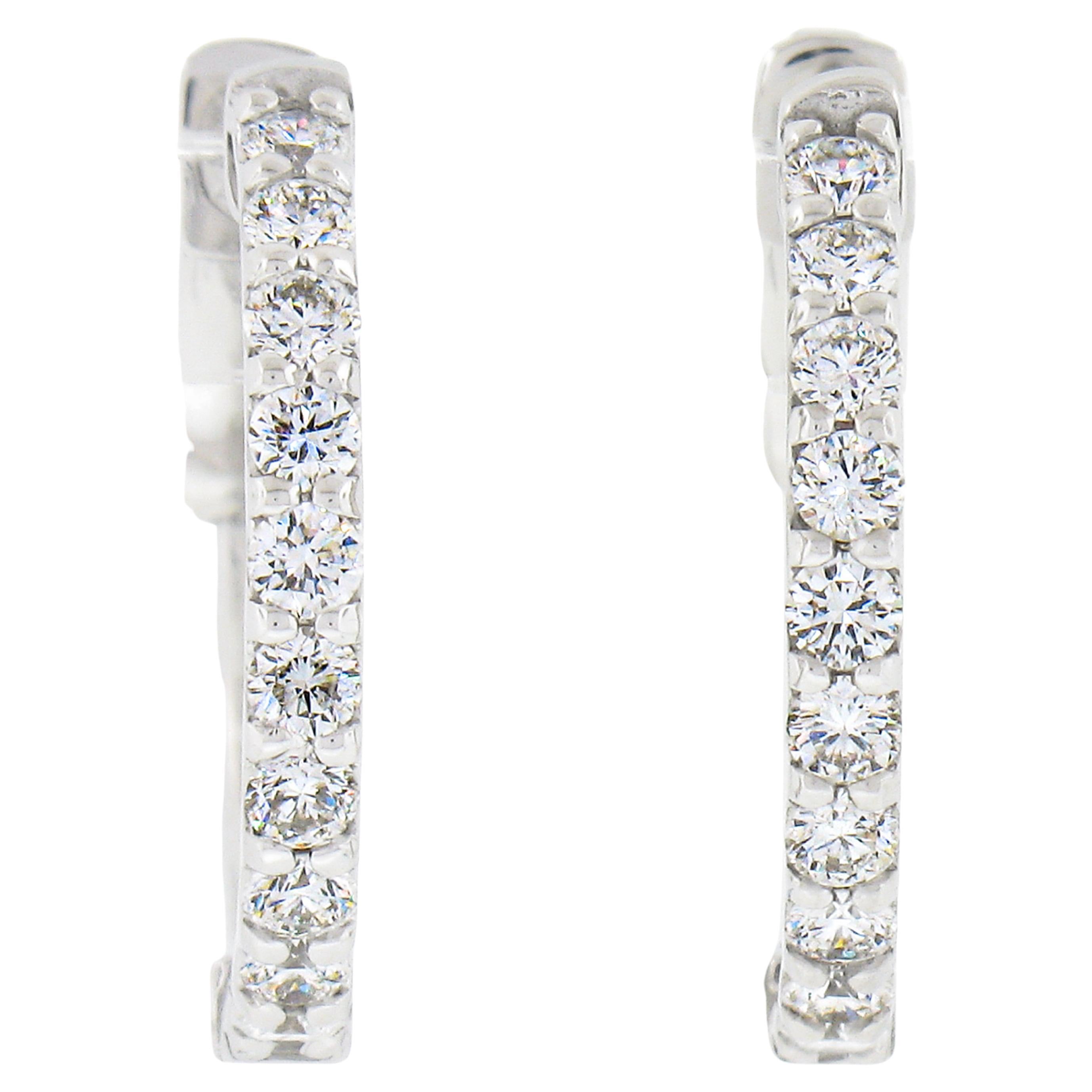 New Classic 14k White Gold 0.60ctw 20 Round Diamond Huggie Hoop Earrings For Sale