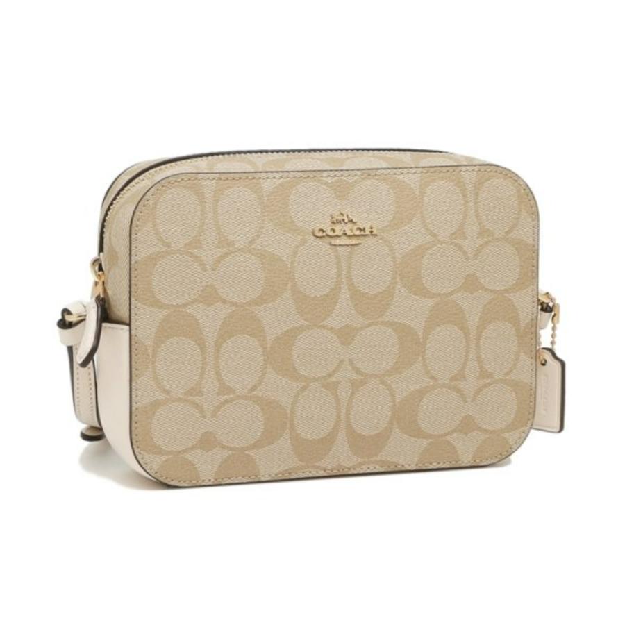 white and brown coach purse