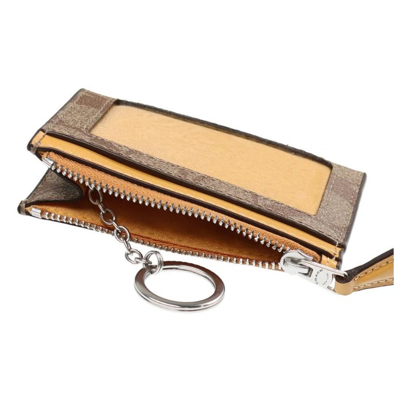 NEW Coach Brown Yellow Mini Skinny ID Case Signature Canvas Card Case Wallet For Sale at 1stDibs
