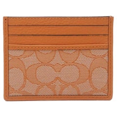 Coach - Portefeuille en cuir Jacquard orange, signature, pour cartes de crédit, état neuf