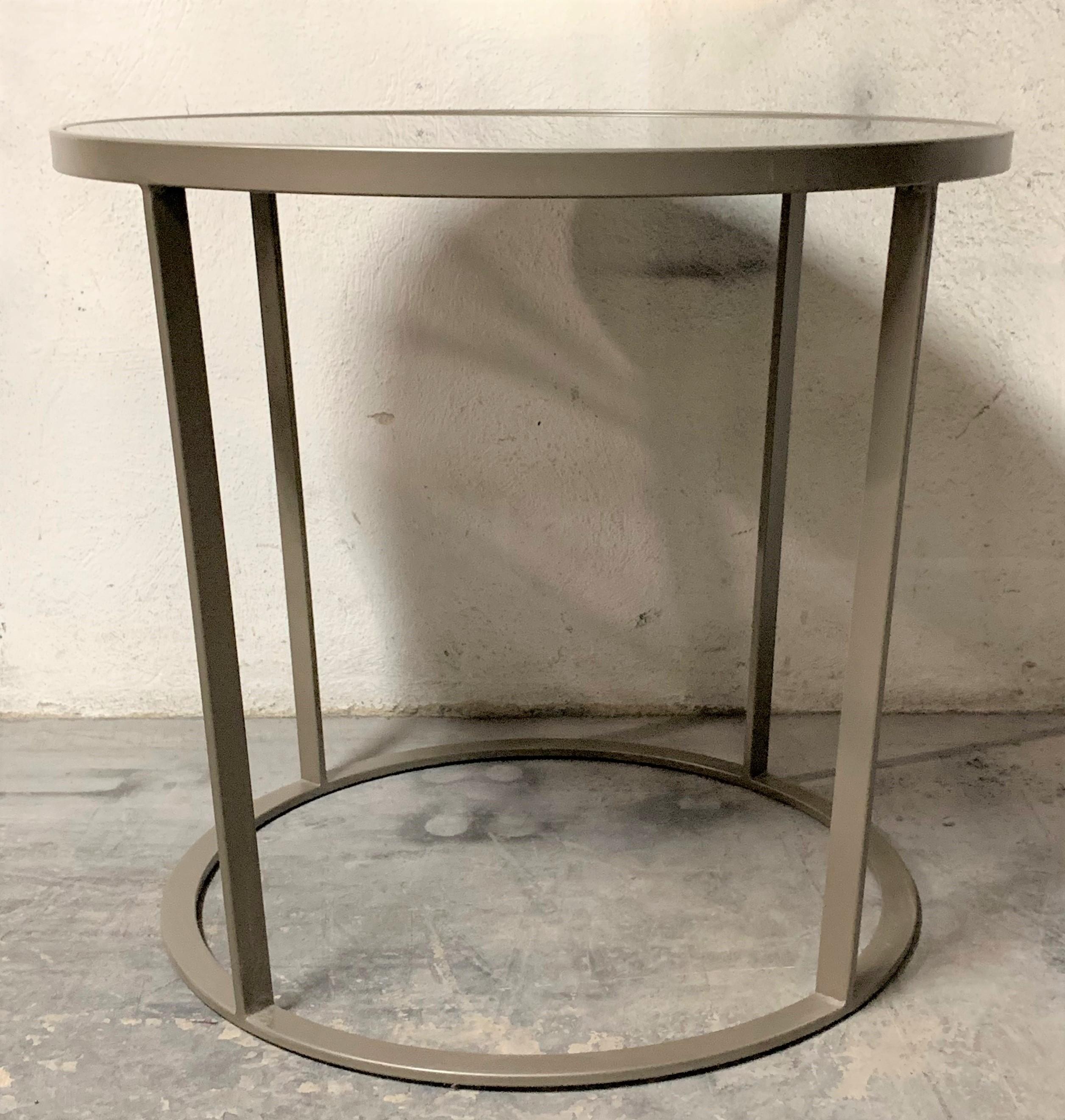 New coffee or side table in champagne color with smoked mirrored glass top.