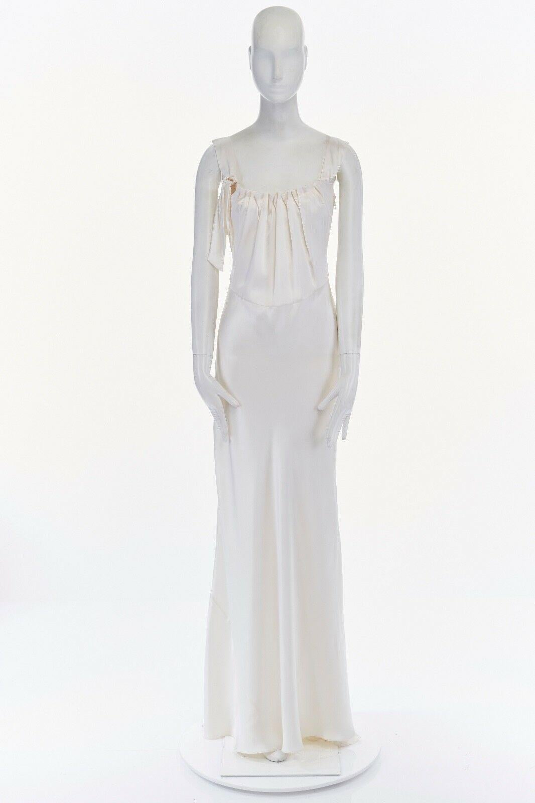 new COLLETTE DINNIGAN ivory bow tie strap pleated neckline evening gown dress S
COLLETTE DINNIGAN
Ivory silk from China . 
Gather pleated neckline . 
Tie bow detail on shoulder strap attachment . 
Draped body . 
Attached self tie back sash on side