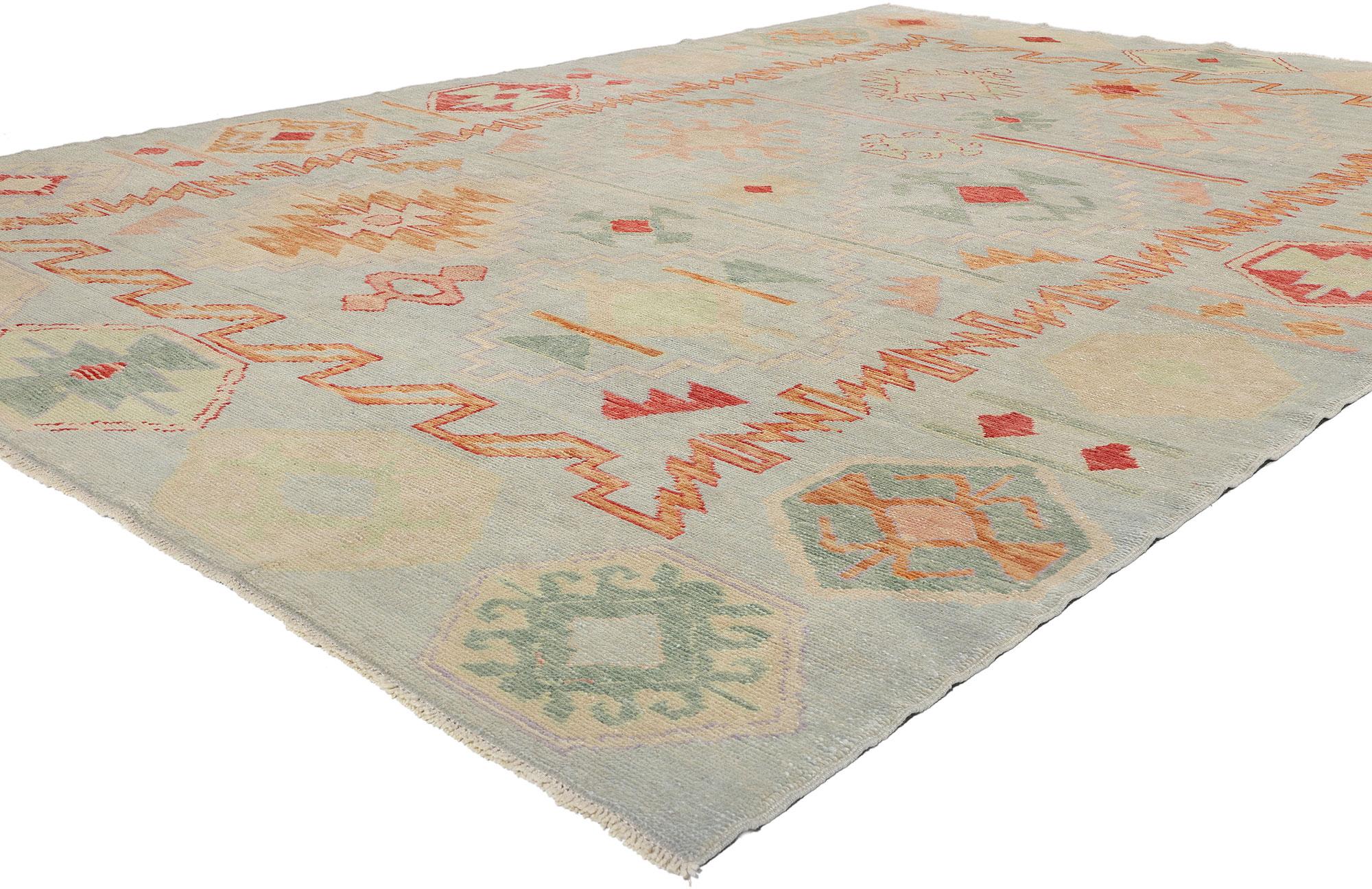 53979 New Modern Turkish Oushak Rug, 09'00 x 13'00. This hand-knotted wool modern Turkish Oushak rug weaves a tale of ancient symbolism and artistry, blending contemporary appeal with timeless Anatolian traditions. The Oushak rug’s soft gray field