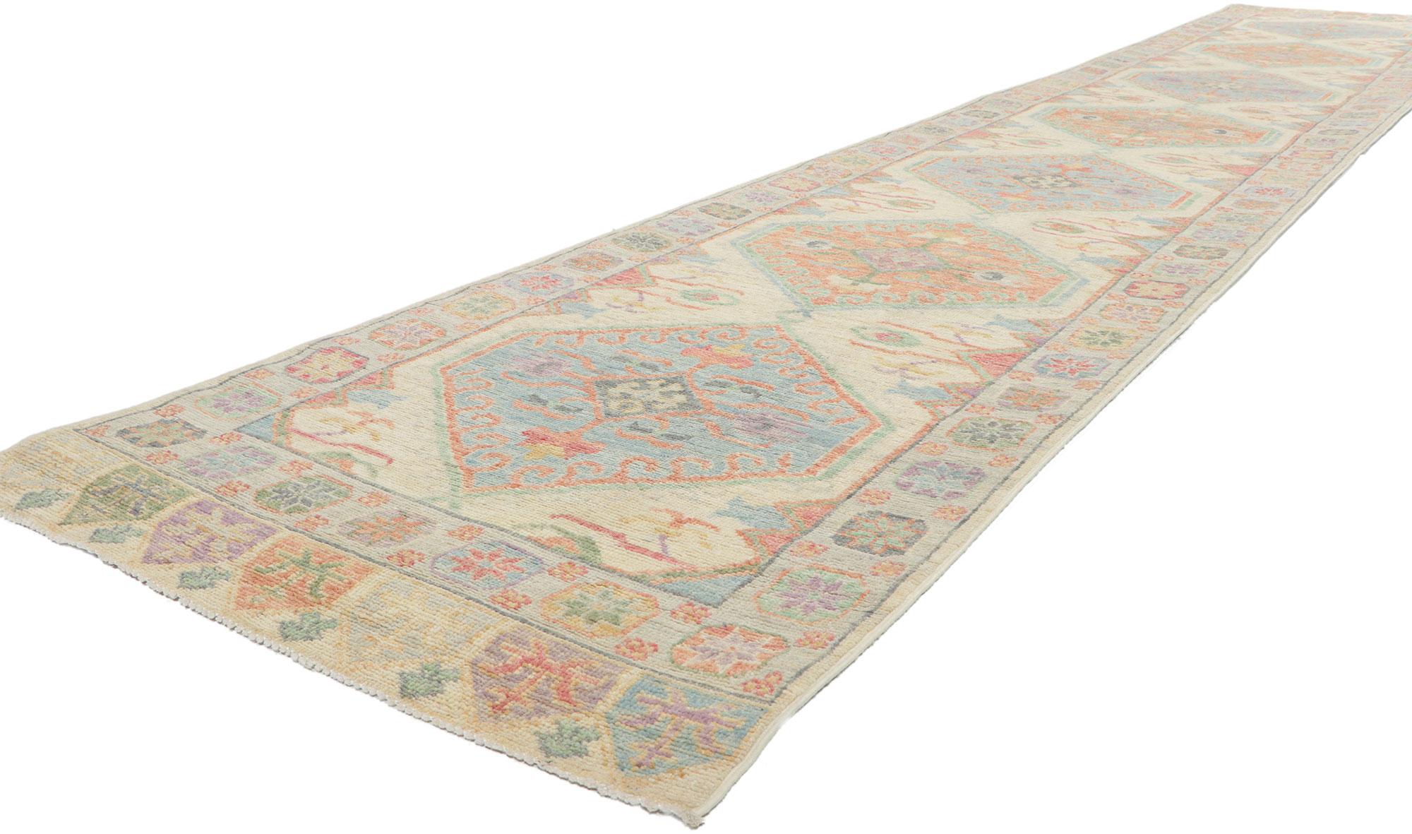 80881 New Colorful Oushak Runner with Modern Style 02'11 x 16'07.
Polished and playful with a hint of nomadic charm, this hand-knotted wool contemporary Oushak runner beautifully embodies a modern style. The abrashed field features hooked medallions