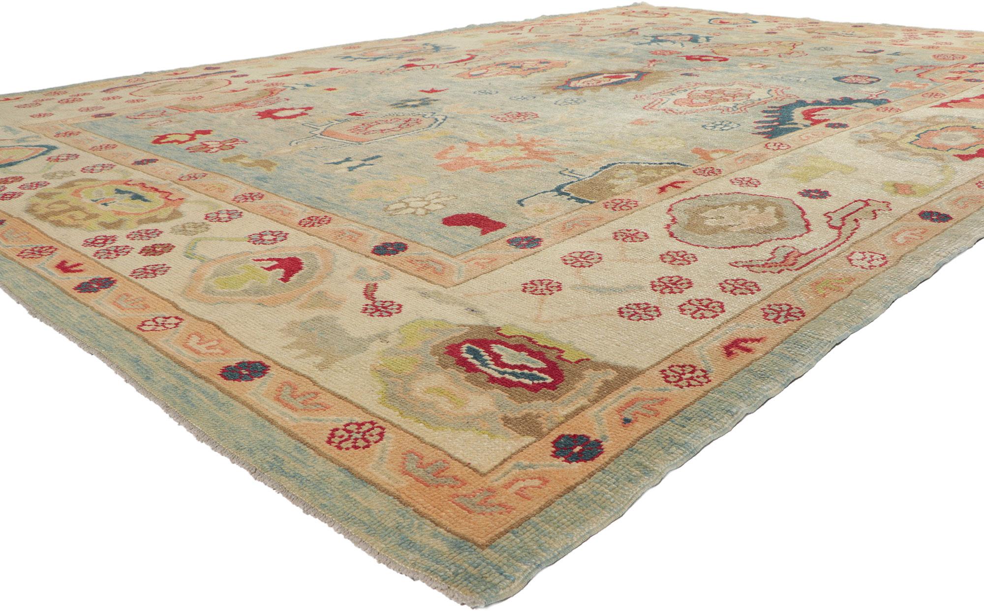 53813 New Turkish Oushak rug with Modern Style 09'08 x 14'00. Polished and playful, this hand-knotted wool contemporary Turkish Oushak rug beautifully embodies a modern style. The abrashed bluish colored field features an array of Harshang motifs,