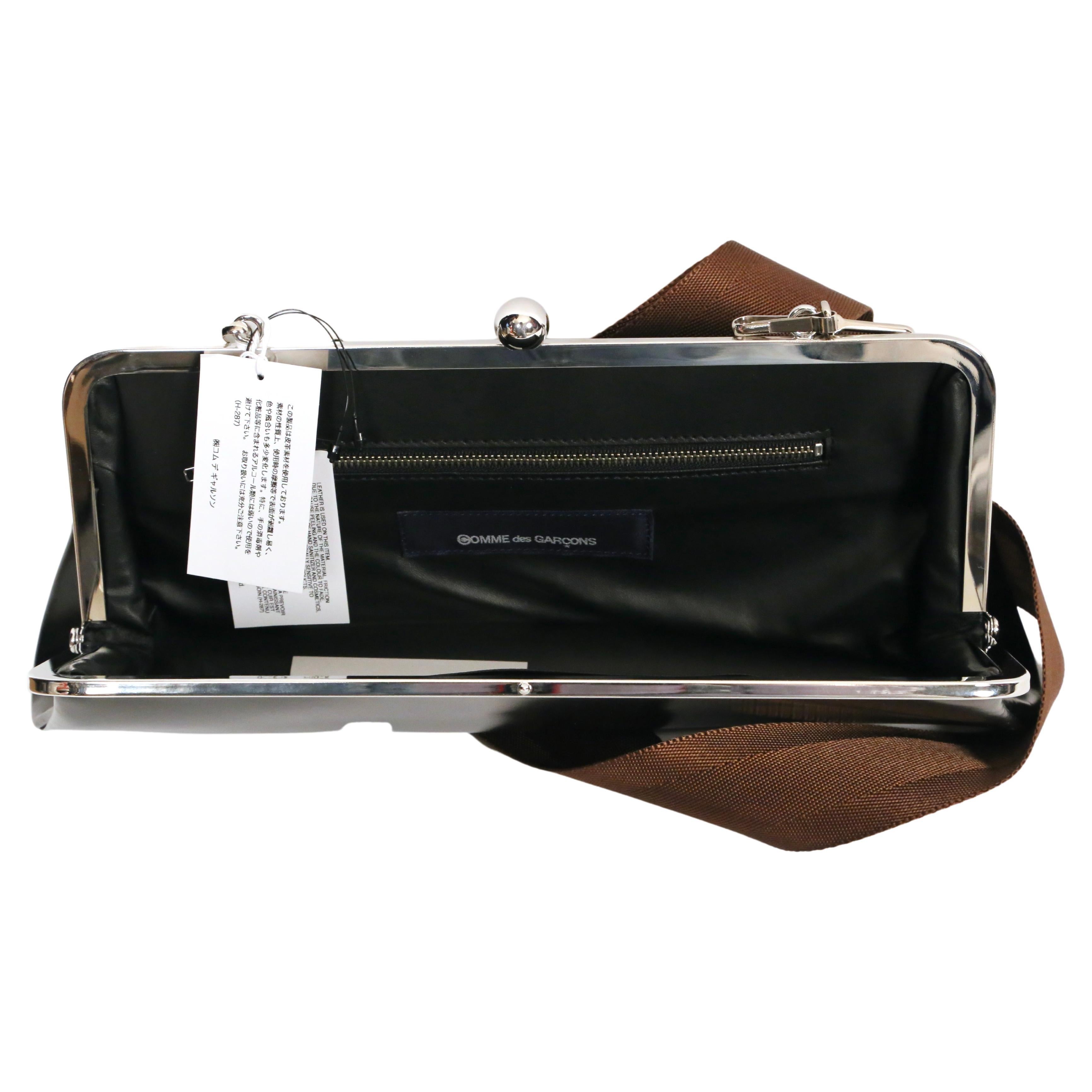 new COMME DES GARCONS black leather cross body bag with silver frame 1
