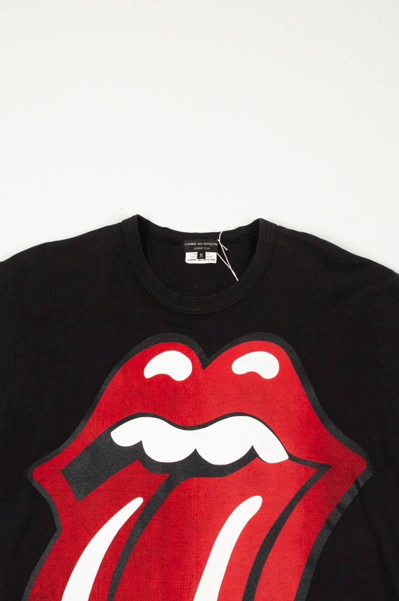 Item for sale is 100% genuine Comme Des Garcons Homme Plus Lips Print Men T-Shirt 
Color: black
(An actual color may a bit vary due to individual computer screen interpretation)
Material: 100% cotton
Tag size: M
This t shirt is great quality item.