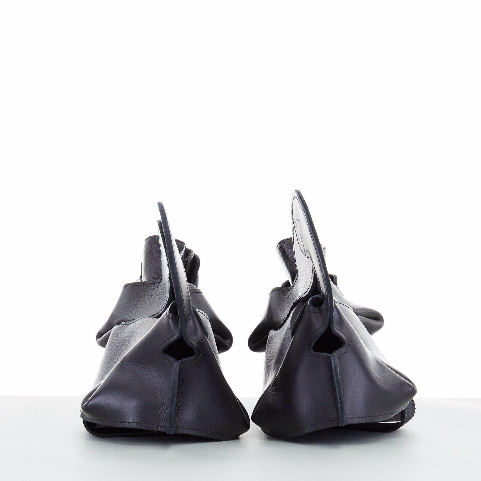 Black new COMME DES GARCONS SS14 rare black structured padded leather shoe cover