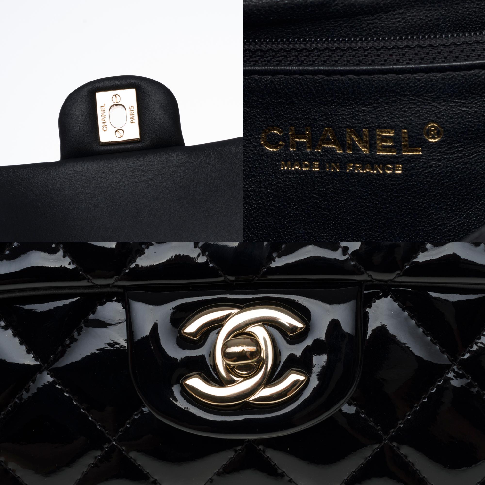 Black New Condition- Chanel Clutch in black patent quilted leather, Champagne hardware