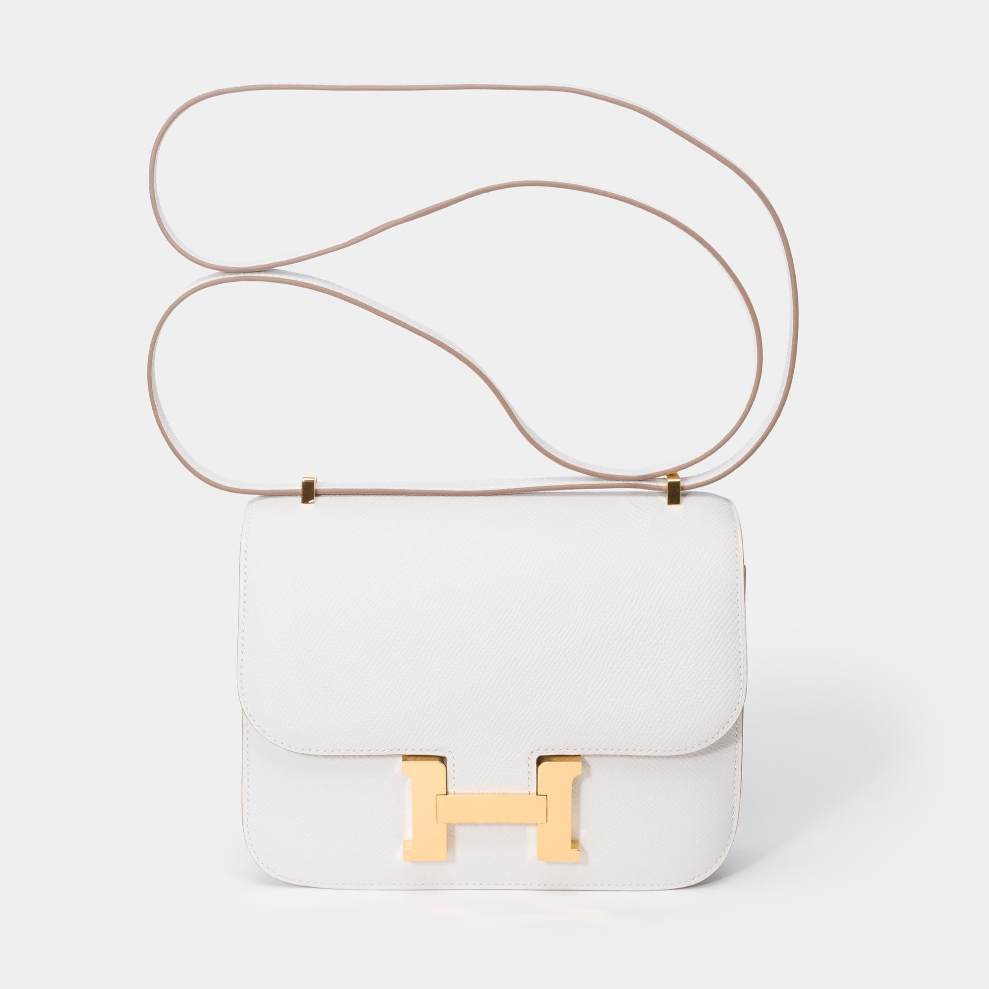 Stunning​​​ ​​Hermès​​ ​​Constance​​ ​​III​​ ​​Mini​​ ​​18​​ ​​Mirror​​ ​​shoulder​​ ​​bag​​ ​​in​​ ​​Gris​ ​Pale​ ​Epsom​​ ​​calf​​ ​​leather,​​ ​​gold​​ ​​plated​​ ​​metal​​ ​​trim​​ ​​,a​​ ​​​grey​ ​epsom​​ ​​leather​​ ​​shoulder​​ ​​strap​​