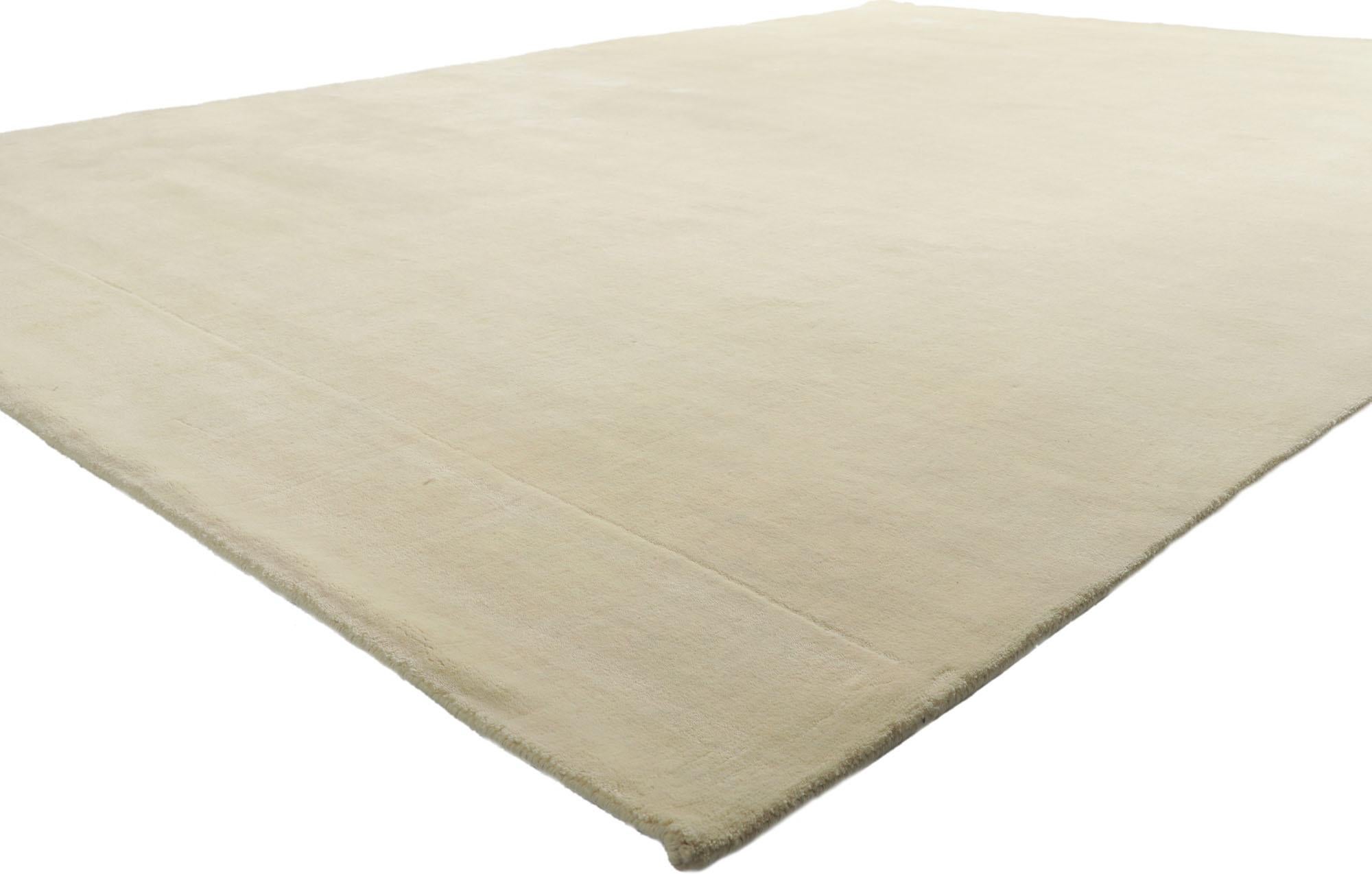 30756 New Contemporary Ivory Rug with Minimalist Style, 08'11 x 11'11. Enveloped in a captivating realm of contemporary elegance and subtle minimalism, this hand-loomed wool rug hails from the artisanal looms of modern India. Its essence seamlessly
