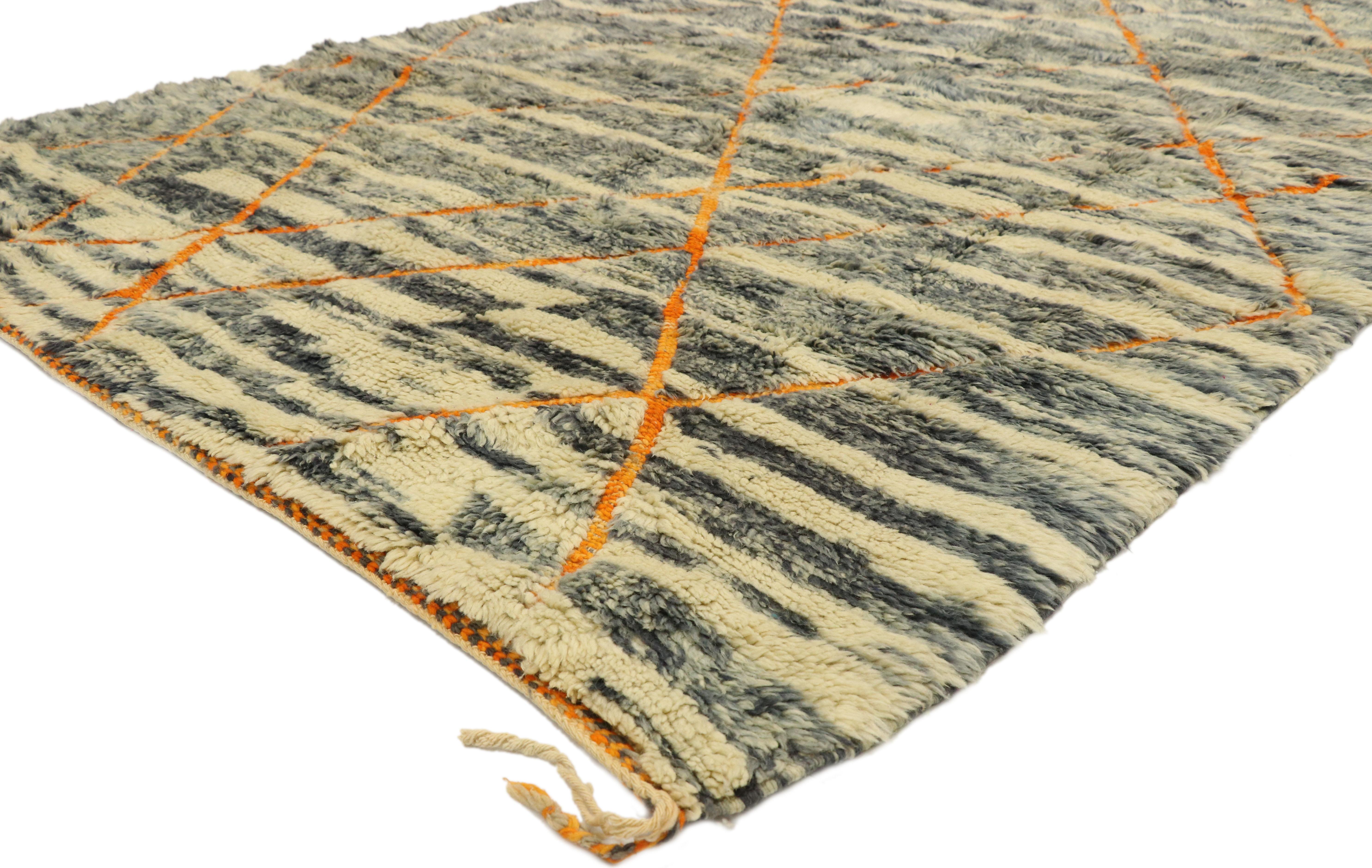 20993 New Contemporary Beni Mrirt Carpet, Berber Moroccan rug. This hand knotted wool contemporary Moroccan area rug features contrasting orange colored lines running the length of the abrashed cream and steel gray field. The asymmetrical lines