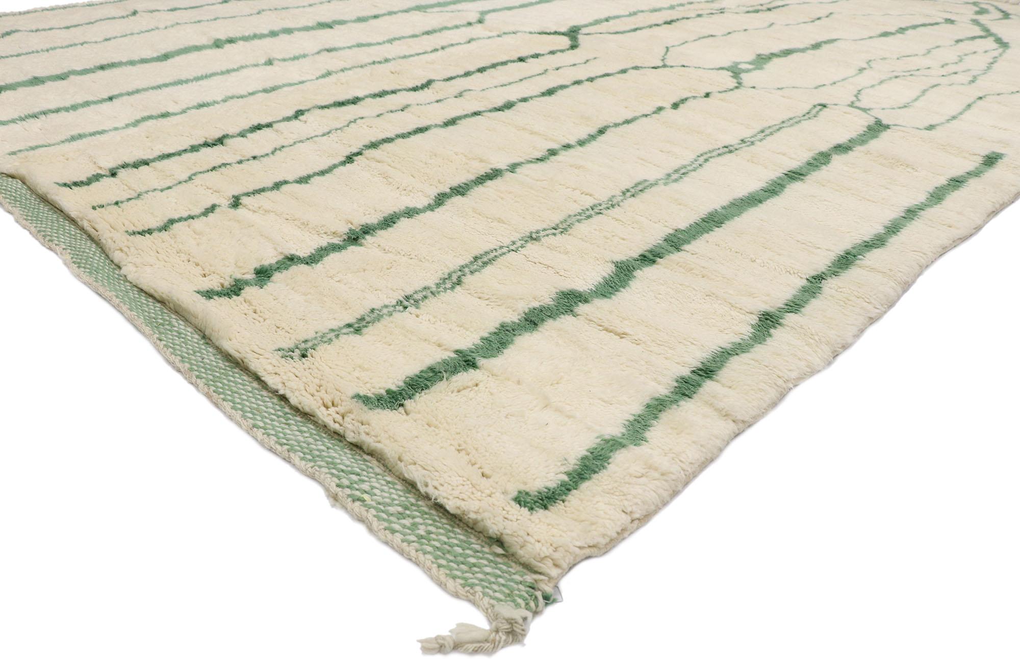 21122 New Contemporary Berber Moroccan rug with Biophilic Design 08'11 x 12'02. Cozy contemporary meets Biophilic Design while providing relaxation and a vision of aesthetic perfection. The abrashed beige field features green lines running from the