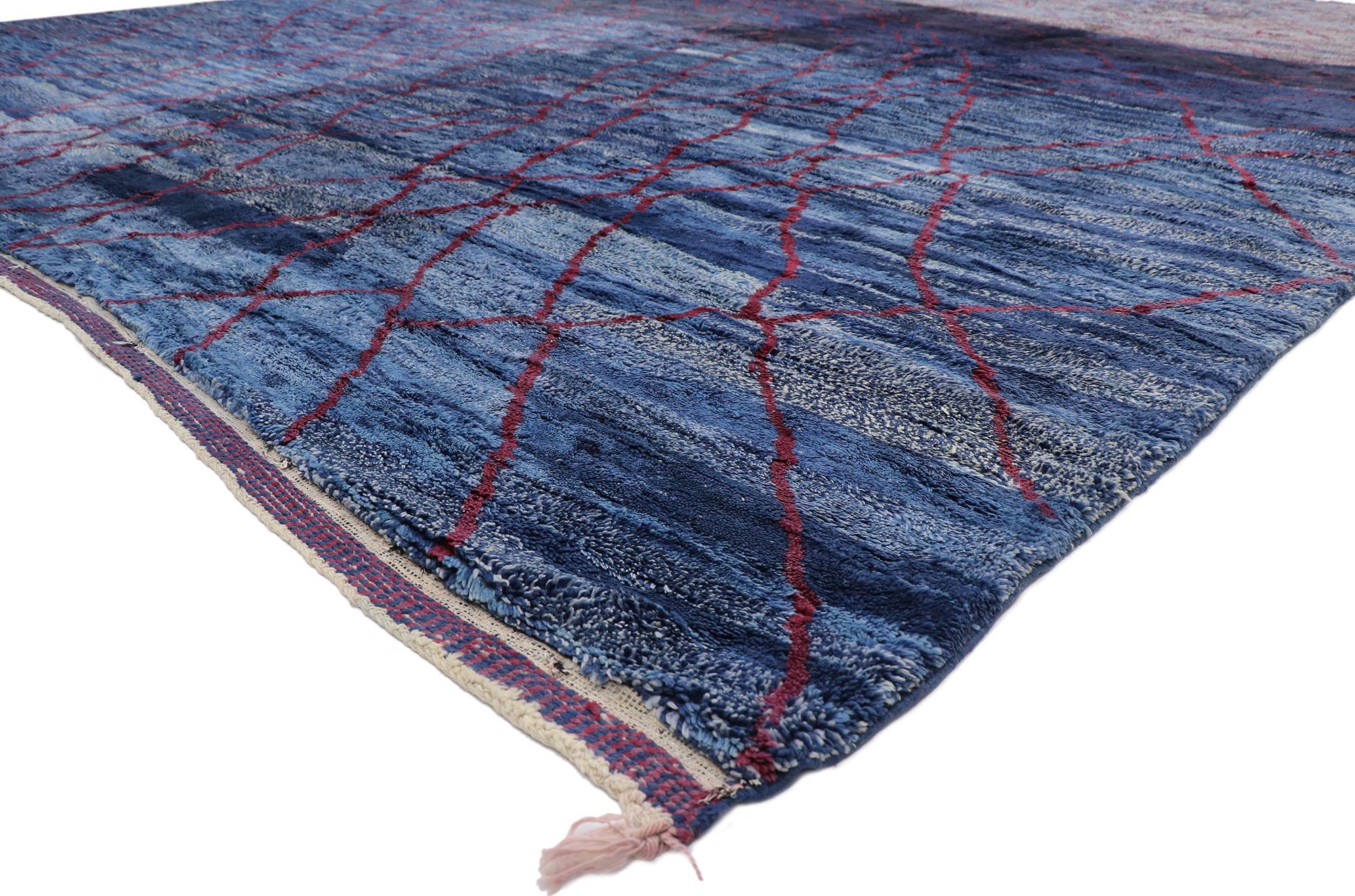 21103 New Oversized Berber Abstract Moroccan Rug 14'11 x 20'01.
With its incredible detail and lavish texture, this hand knotted wool oversized Abstract Moroccan rug is a captivating vision of woven beauty. It features raspberry red colored lines