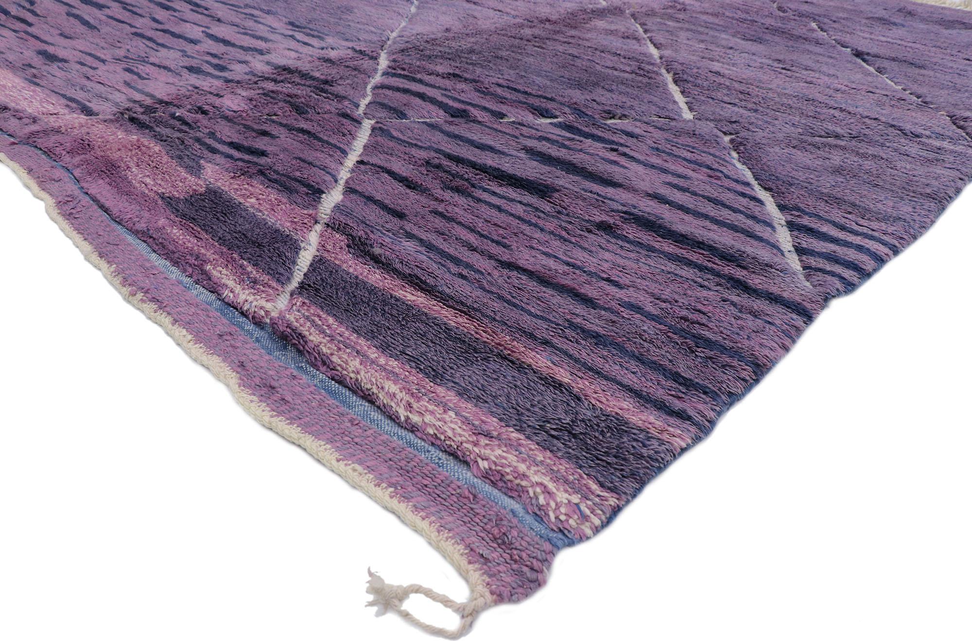 21138 Large Purple Abstract Moroccan Rug, 09'02 x 11'08.
Emulating boho chic style with a plush pile, this hand knotted wool purple abstract Moroccan rug is a captivating vision of woven beauty. The visual complexity and dreamy color palette palette