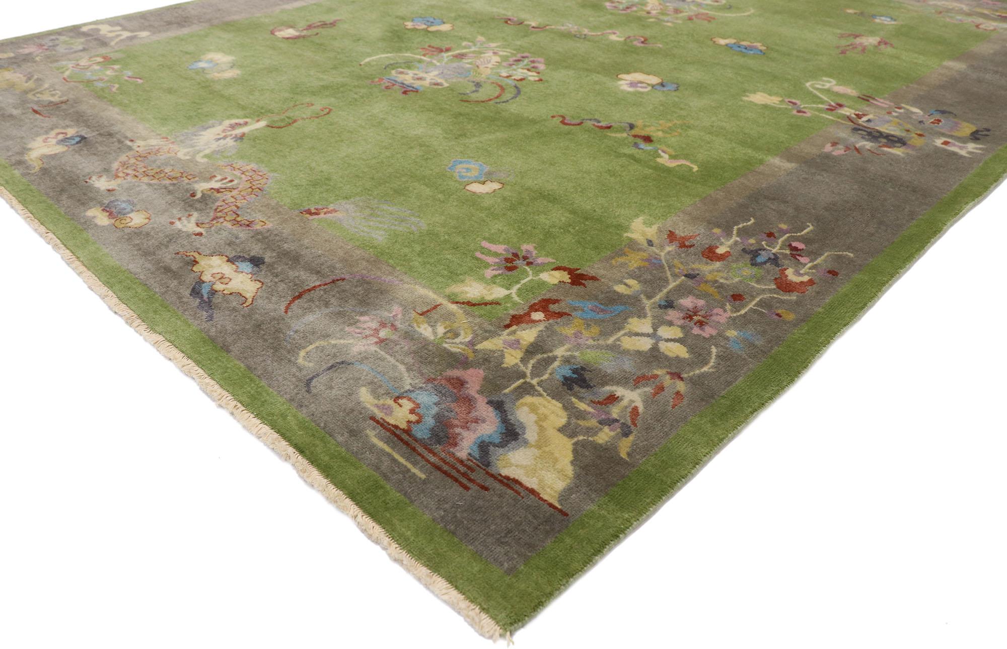 30643, new Contemporary Chinese Art Deco style Pictorial Dragon rug. This hand-knotted wool contemporary Chinese Art Deco style rug features a variety of pictorial images overlaid upon an abrashed color-blocked field and border scheme. An array of