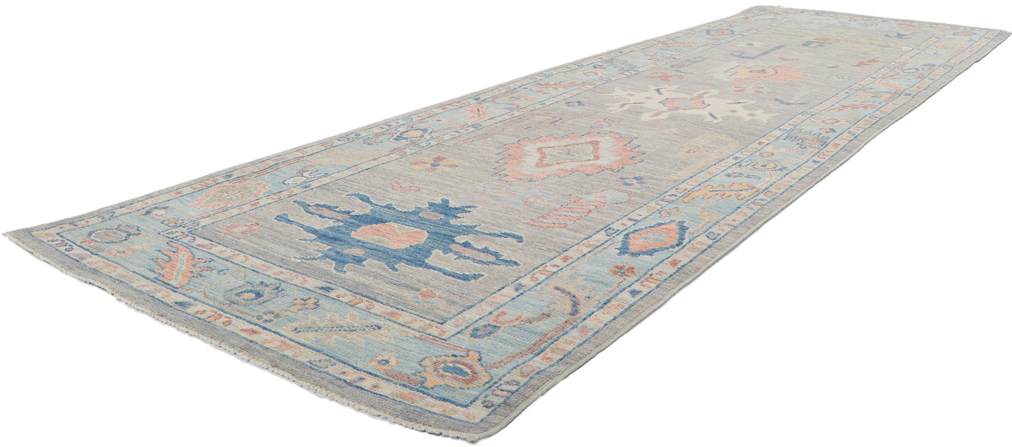 80858 New colorful Oushak runner, 03'00 x 09'11. ?Serene and sophisticated, this hand knotted wool colorful Oushak runner is poised to impress. The composition features an allover botanical pattern composed of amorphous organic motifs spread across