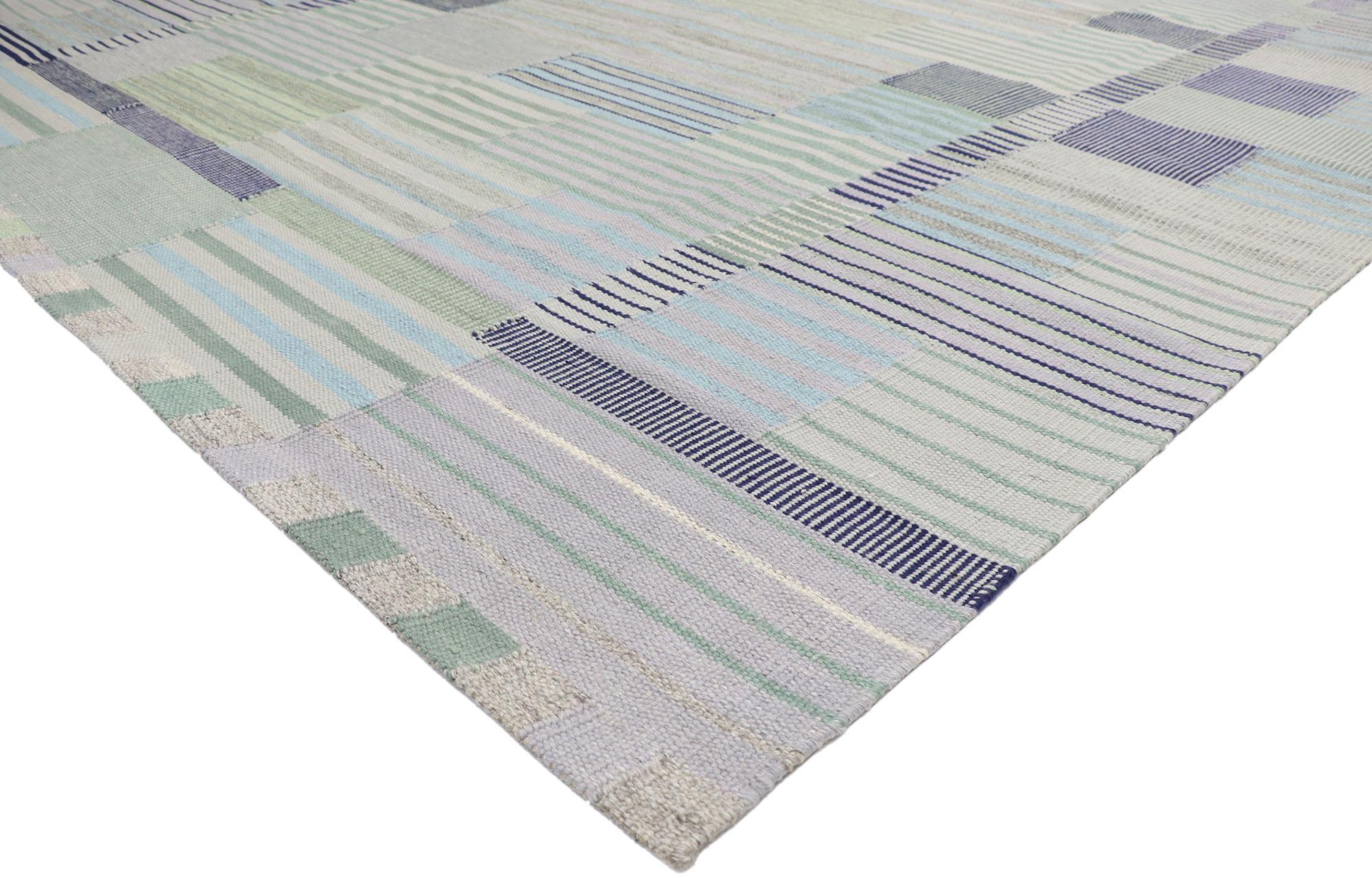 30636 New Marianne Richter Swedish Inspired Kilim Rug, 10'03 x 12'10.
Drawing inspiration from Marianne Richter and her design Fasad Ljus, this handwoven wool Swedish style kilim rug is a captivation vision of woven beauty. The eye-catching linear