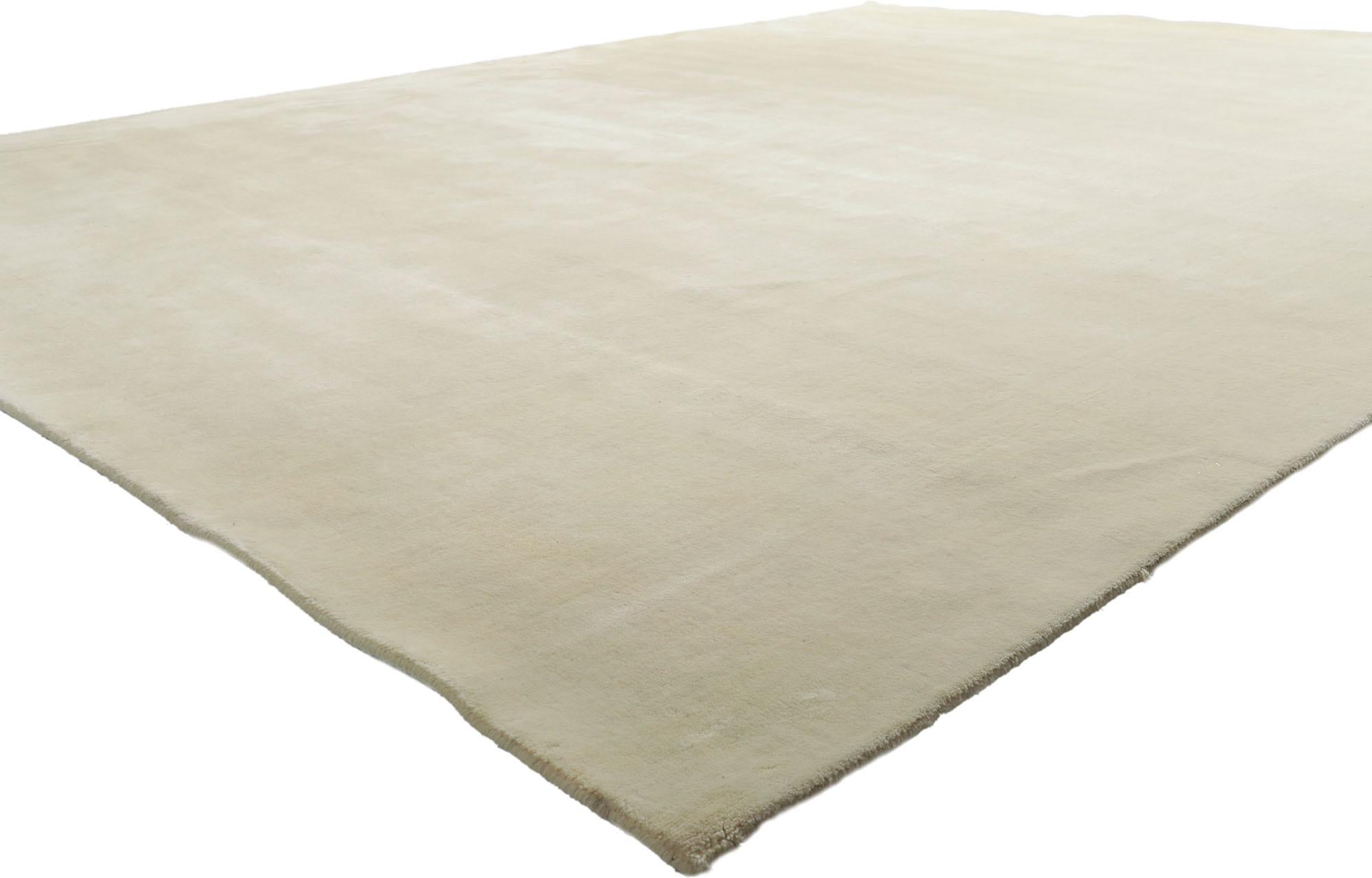 30749 New Contemporary Ivory Area Rug with Minimalist Style, 10'00 x 12'10. Submerged in the captivating realm of contemporary allure and nuanced minimalism, this impeccably crafted wool rug gracefully unfolds from the adept looms of modern India.