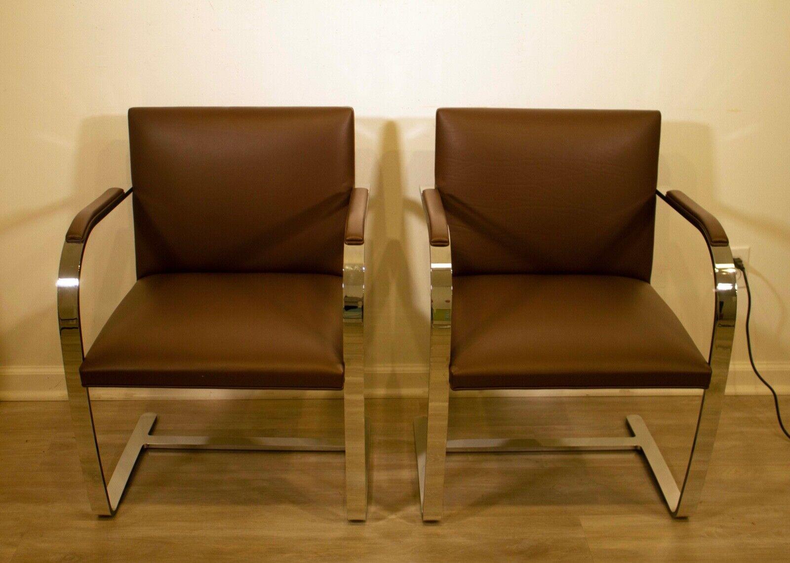 The Brno Chair is a timeless design by Ludwig Mies van der Rohe that has been praised for its simplicity, elegance, and comfort. This contemporary iteration of the chair features a chrome-plated steel frame and brown leather upholstery. The arm pads