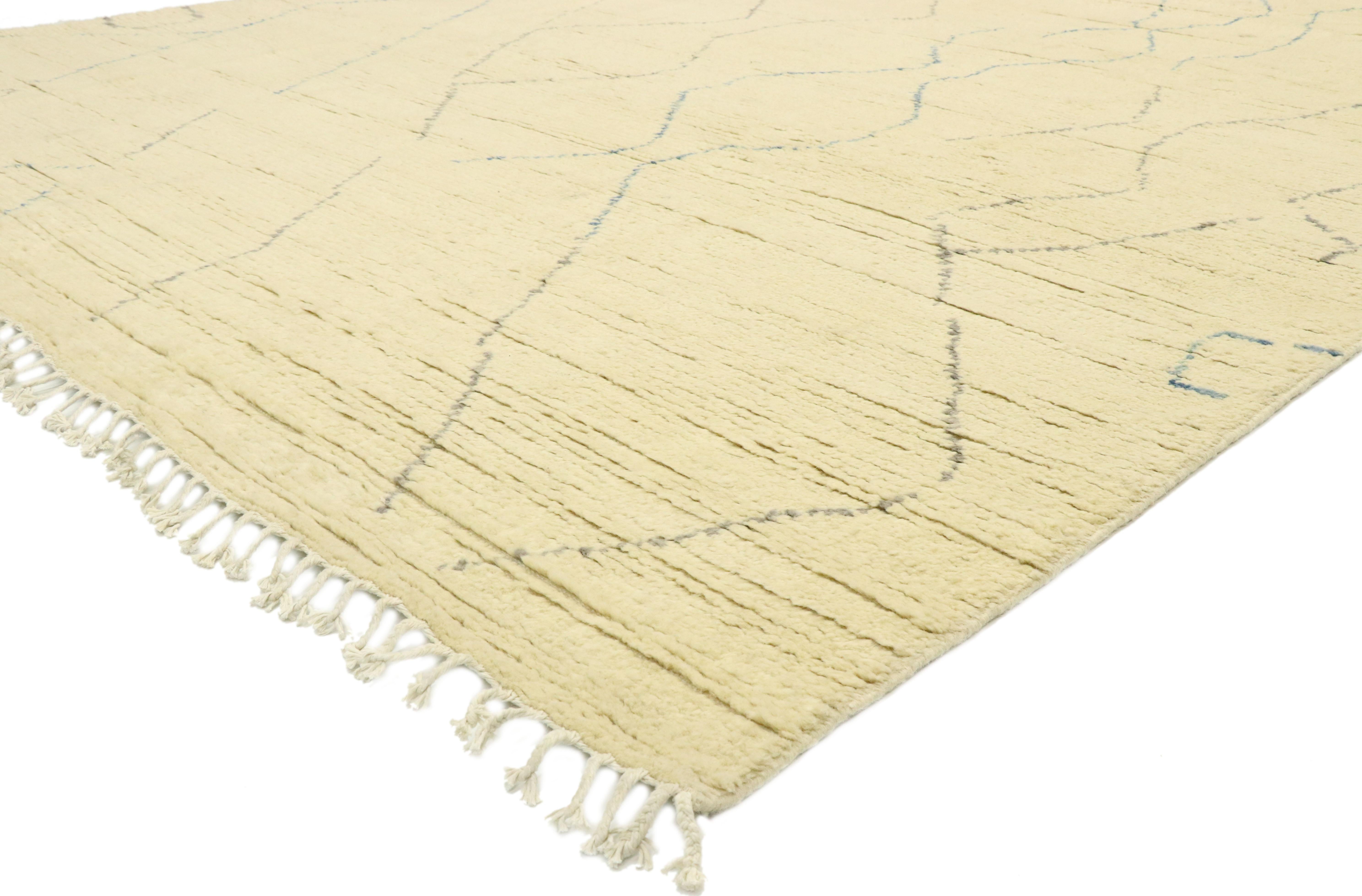 80631, new contemporary Moroccan Area rug with cozy boho chic style and hygge vibes. This hand knotted wool contemporary Moroccan area rug features contrasting gray and light blue lines running the length of the sandy-beige backdrop. The thin lines