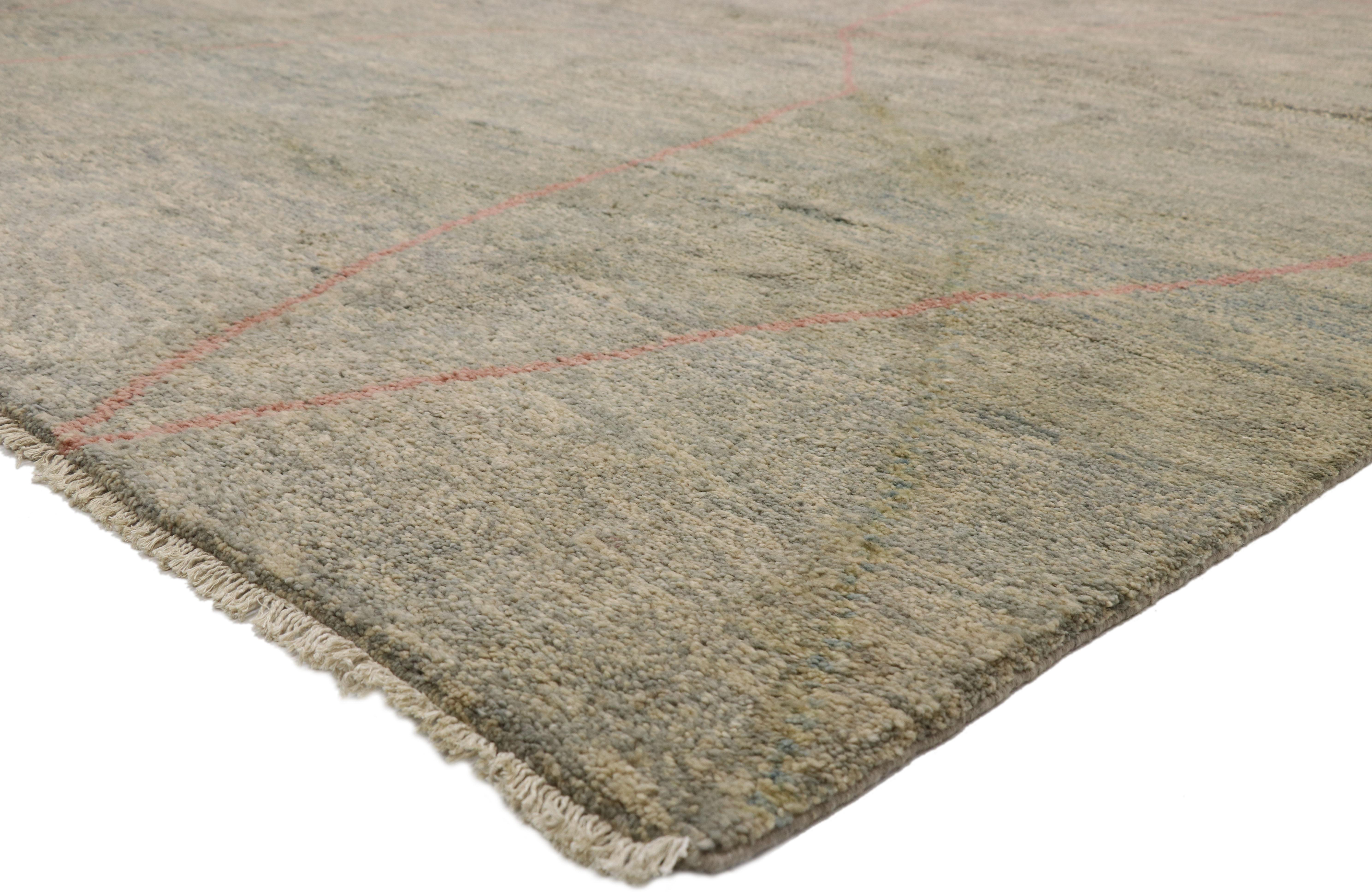 80536 Modern Earthy Moroccan Rug, 10'00 x 13'05.
This hand knotted wool contemporary Moroccan area rug features contrasting rose pink lines running the length of the bluish-grayish backdrop. The thin lines criss-cross in an organic manner, creating