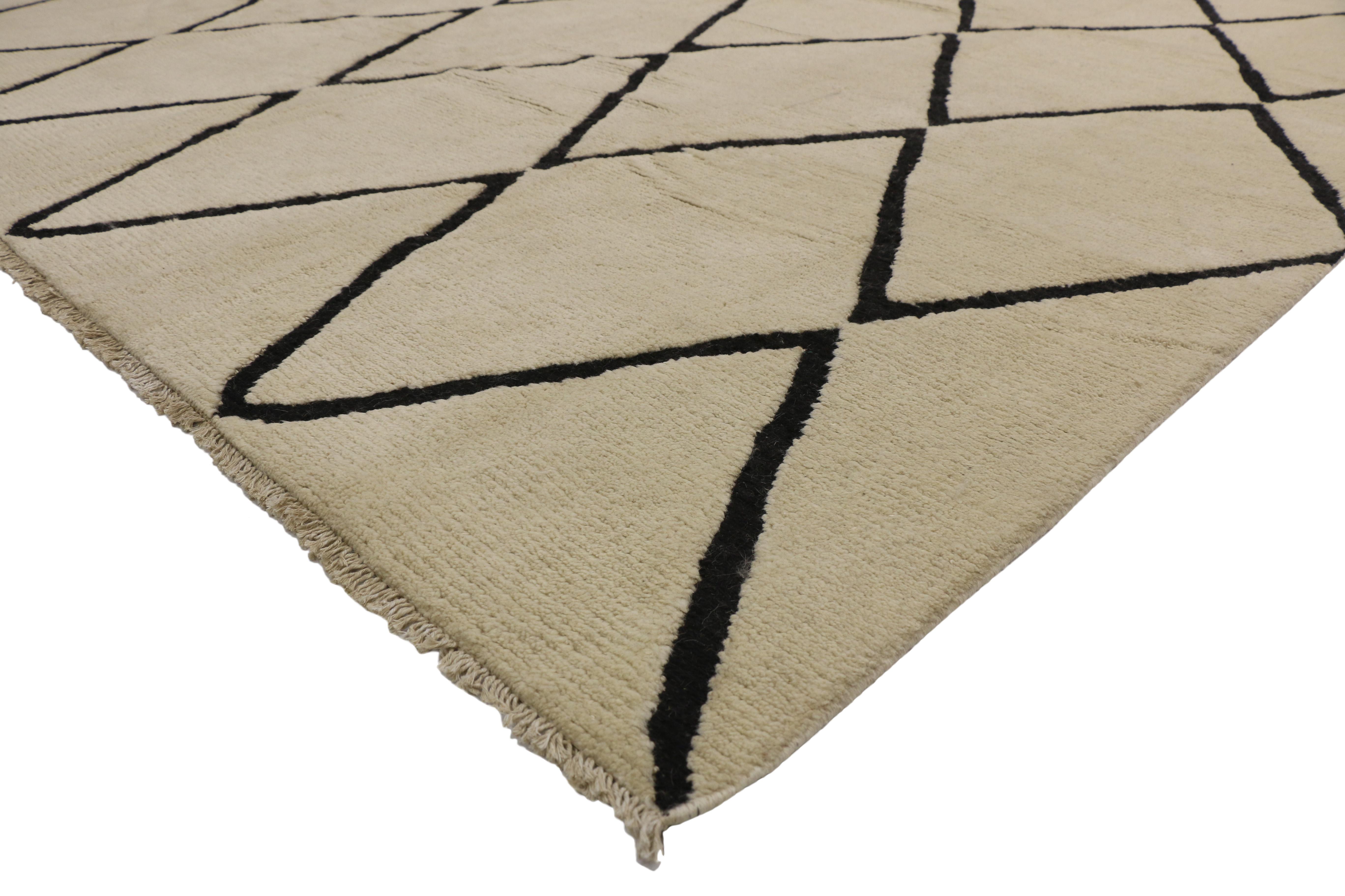 80517 New Contemporary Moroccan Area Rug with Modernist Stylen style. This hand knotted wool contemporary Moroccan area rug features contrasting black lines running the length of the sandy-beige backdrop. The thin black lines criss-cross in an