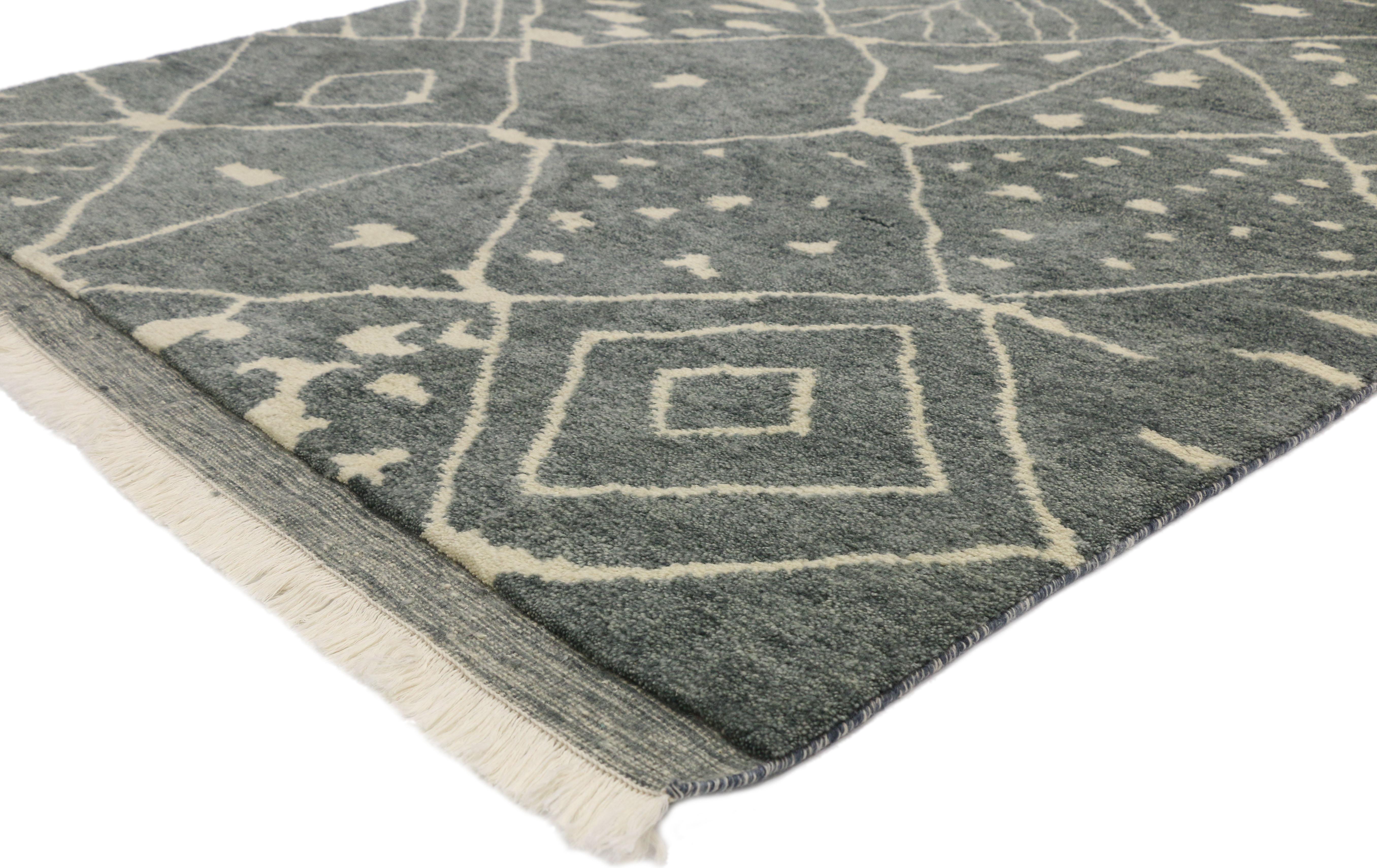 30501, new contemporary Moroccan area rug with organic modern and Hygge style. This hand knotted wool contemporary Moroccan area rug showcases an all-over diamond pattern on a sultry slate gray backdrop. The light gray-beige lines crisscross in an