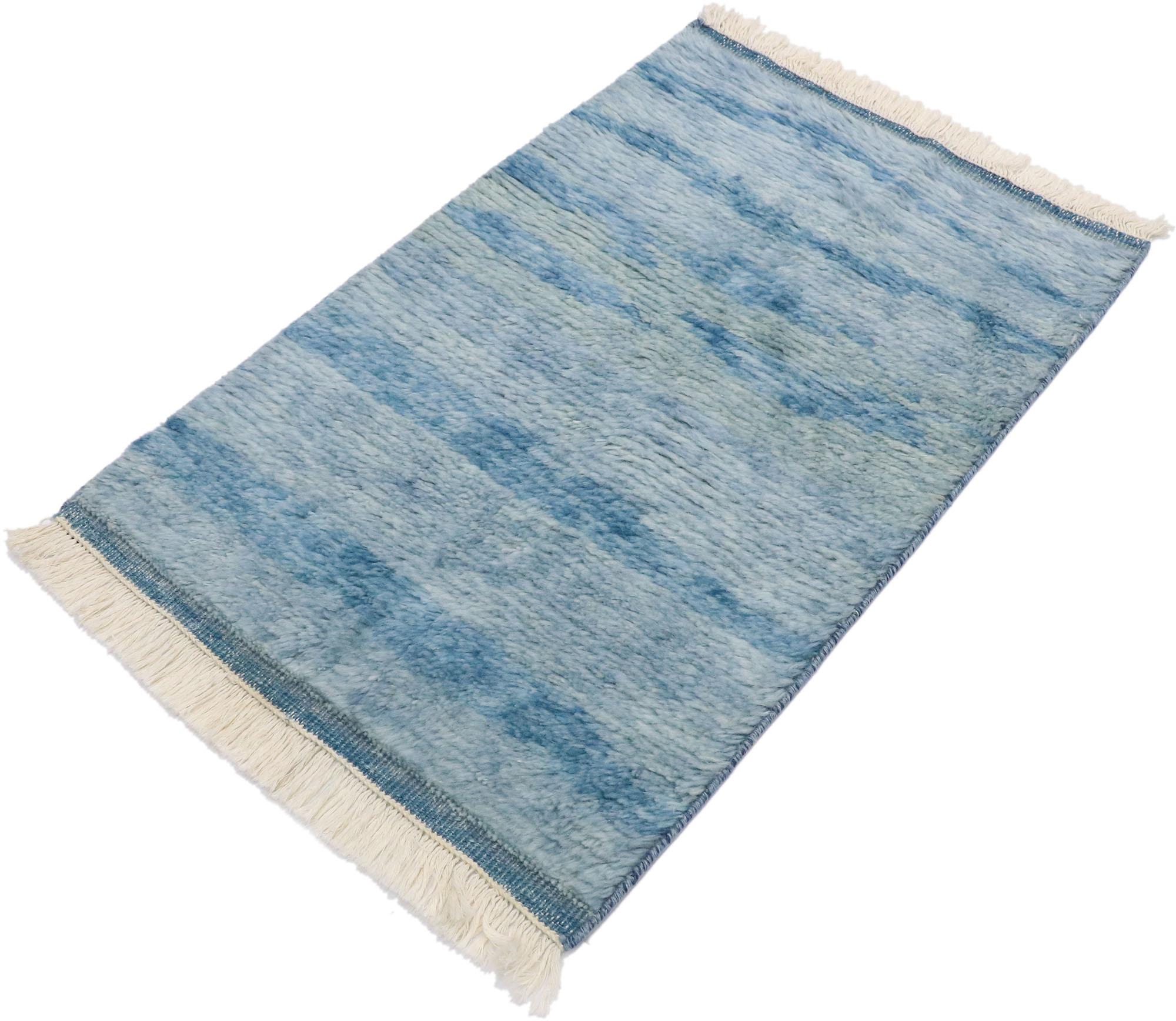 30604, new contemporary Moroccan Beach rug with Modern Coastal style. This hand knotted wool contemporary Moroccan rug features a luminous aqua toned color palette and wonderfully soft pile. Gorgeous waves of abrash and ombre movements between rich