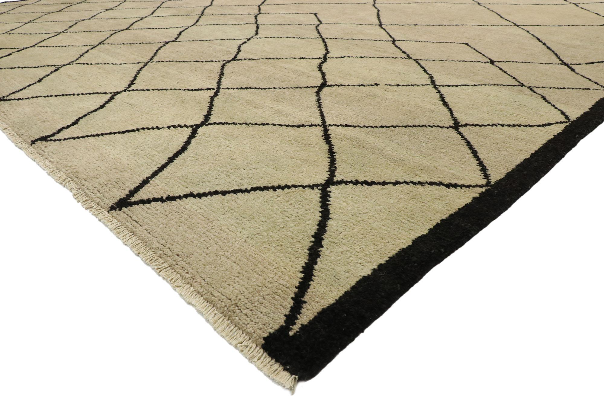 80465, new contemporary Moroccan rug with Mid-Century Modern style. Warm and inviting with cozy hygge vibes, this hand knotted wool contemporary Moroccan style rug features contrasting black lines running the length of the sandy-beige backdrop. The