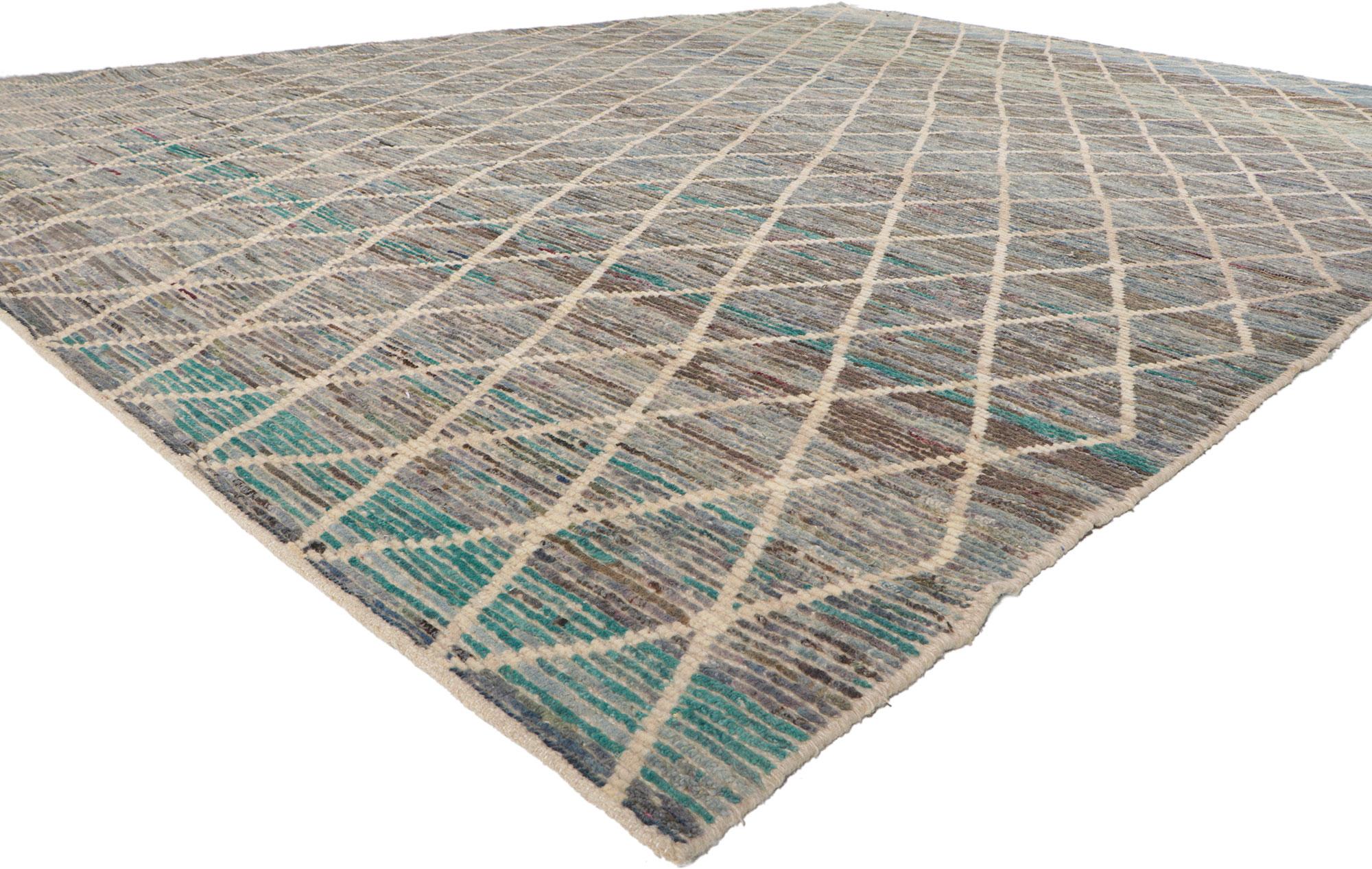 80813 Modern Earth-Tone Moroccan Rug, 10'02 x 13'03.
Emanating nomadic charm with incredible detail and texture, this hand knotted wool Moroccan rug will take on a curated lived-in look that feels timeless while imparting a sense of warmth and