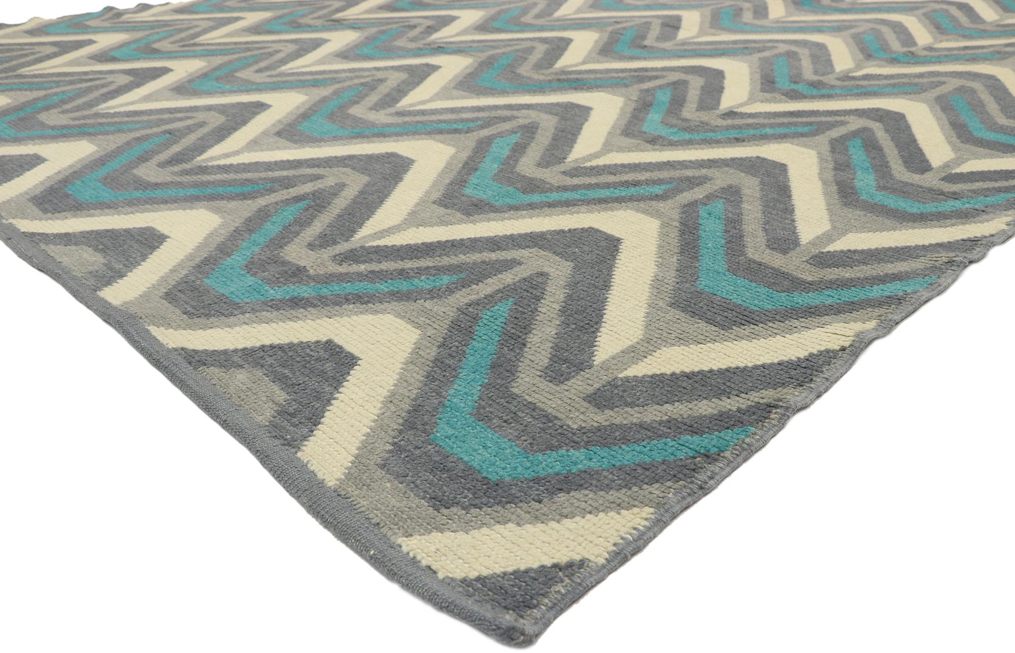 52993 New Modern Chevron Moroccan Rug, 08’10 x 12'07.
Emanating modern style with incredible detail and texture, this hand knotted wool Turkish Moroccan style rug is a captivating vision of woven beauty. The abstract chevron design and energetic