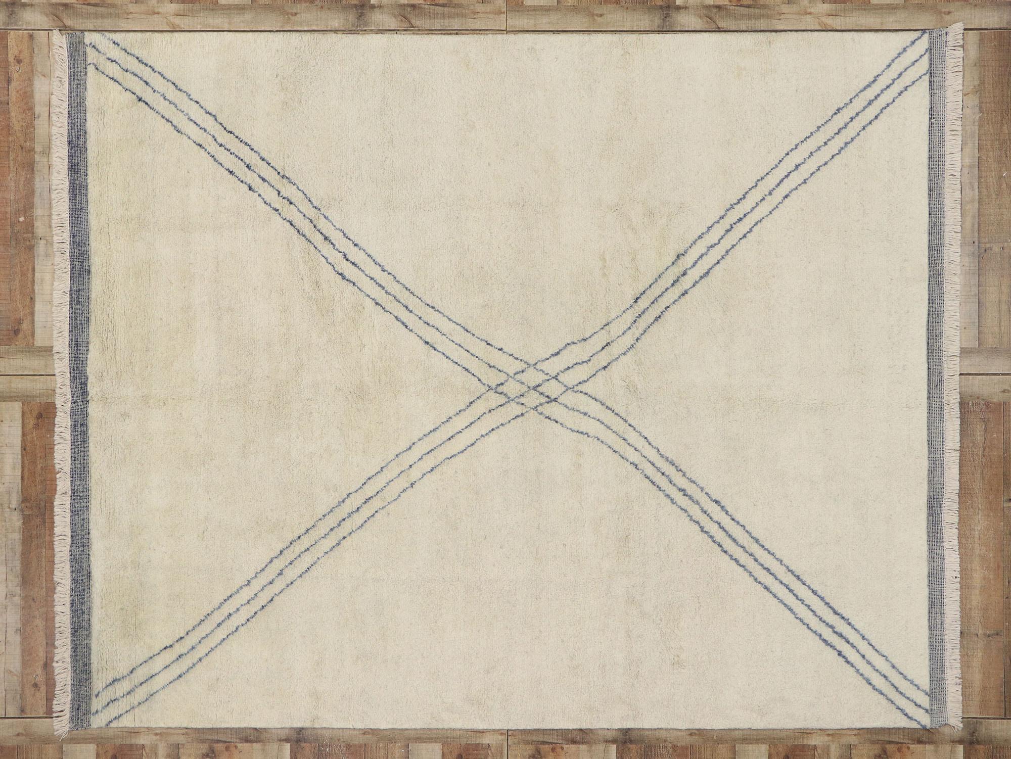 30531, Mid-Century Modern Moroccan Style Rug, 08'01 x 10'02. 
This hand knotted wool Moroccan style rug features a large X-shape composed from three thin bluish lines on a beige backdrop. Beautiful detail and simplistic linear design combined with