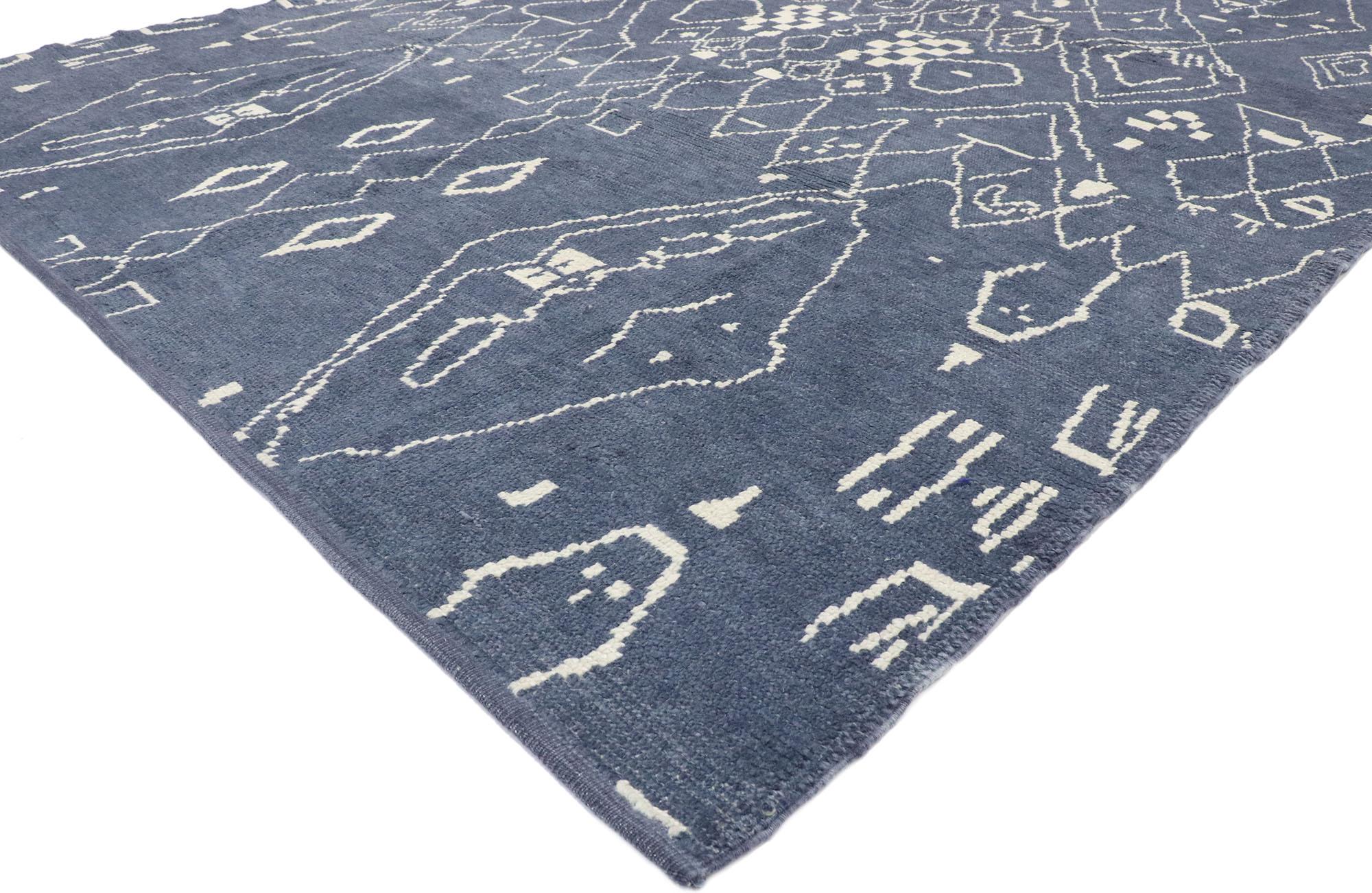 53444, new Contemporary Moroccan style rug with Tribal Design. With its tribal style, incredible detail and texture, this hand knotted wool contemporary Moroccan rug is a captivating vision of woven beauty and a joy to walk upon. The abrashed navy