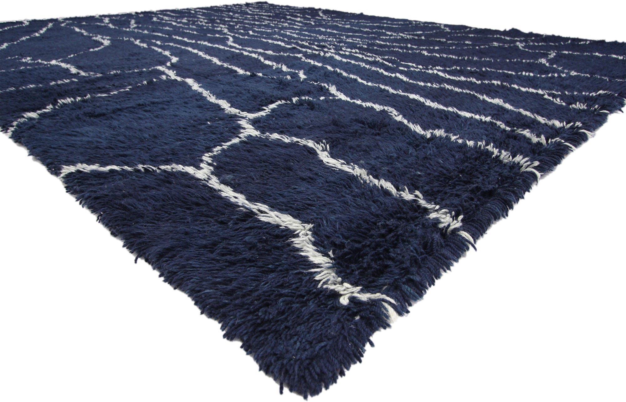 30387 new Contemporary Moroccan style rug 10'10 x 13'04. With its simplicity, plush pile and Mid-Century Modern Bohemian vibes, this hand knotted wool contemporary Moroccan style rug is a captivating vision of woven beauty. The abrashed navy blue