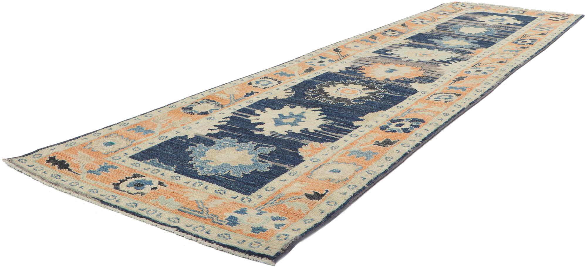 80830 new colorful Oushak runner, 02'05 x 09'04.
With its modern style, incredible detail and texture, this hand knotted wool colorful Oushak runner is a captivating vision of woven beauty. The eye-catching geometric design and lively colors woven