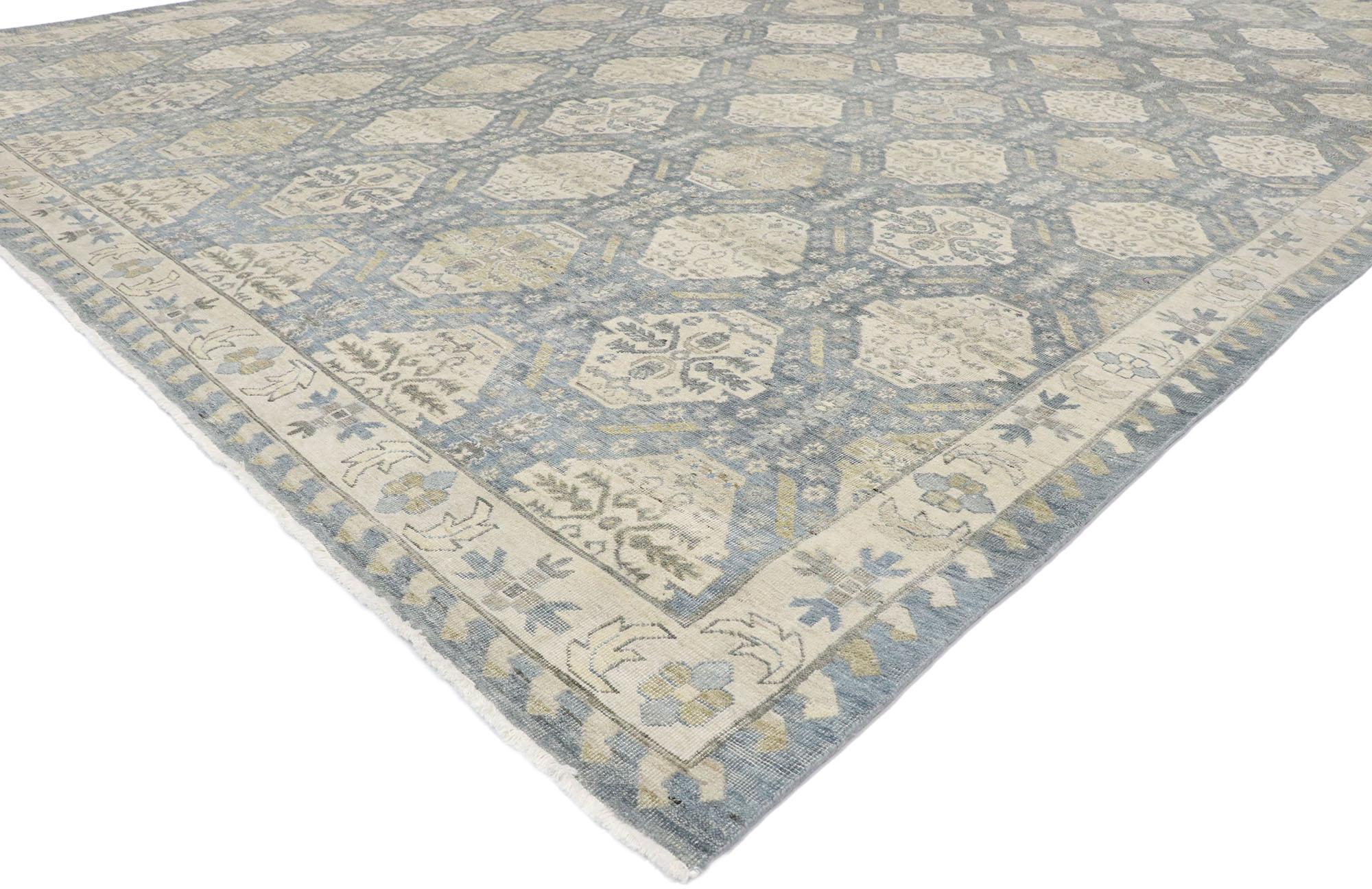 30623 Distressed Vintage-Inspired Oushak Rug, 09'10 x 13'01. A refined testament to heritage and elevated taste, this hand-knotted wool vintage-inspired Oushak rug is a rare treasure of modern artistry rooted in centuries-old tradition. Carefully