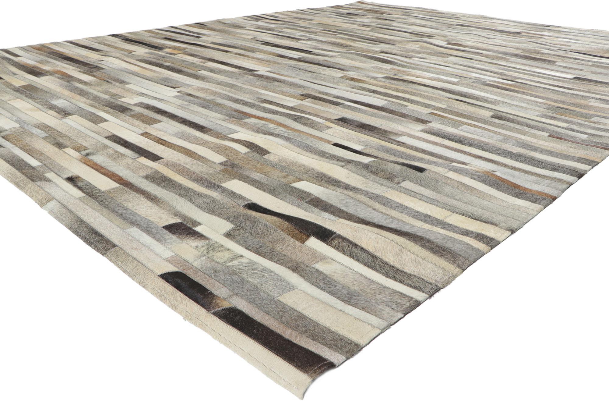 30915 New Contemporary Patchwork Cowhide Rug with Modern Style 09'01 x 12'00. Call the wild indoors and bring a sense of adventure home with this handcrafted cowhide rug. Showcasing a modern design, incredible detail and texture, this leather