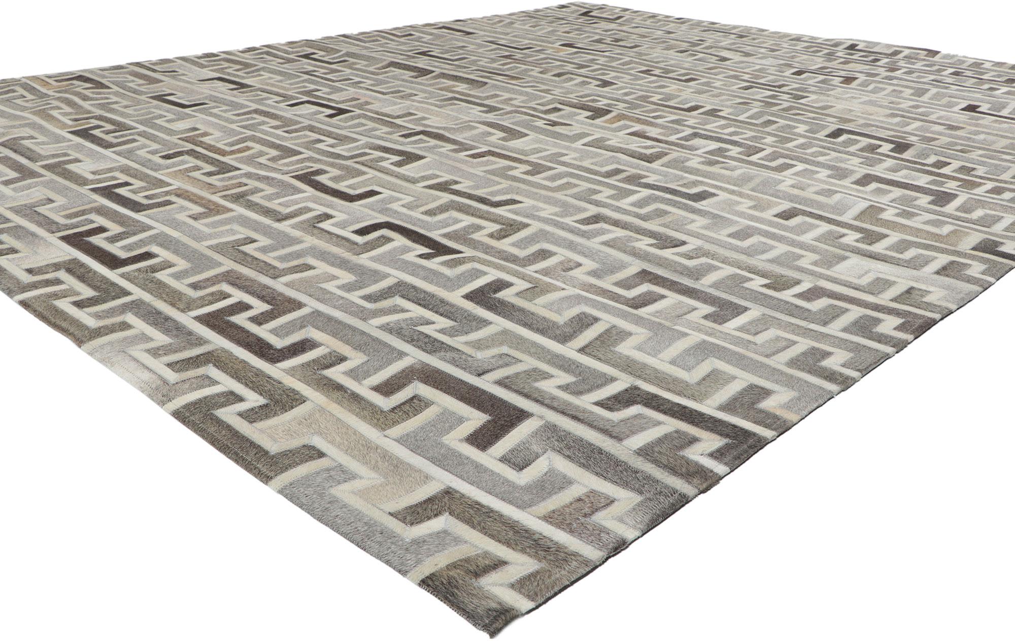 30913 New Contemporary Patchwork Cowhide Rug, 08'00 x 10'00. A celebration of balance and repetition, this hand-crafted contemporary cowhide rug reimagines ancient architectural motifs through the lens of modern design. Its meticulously stitched