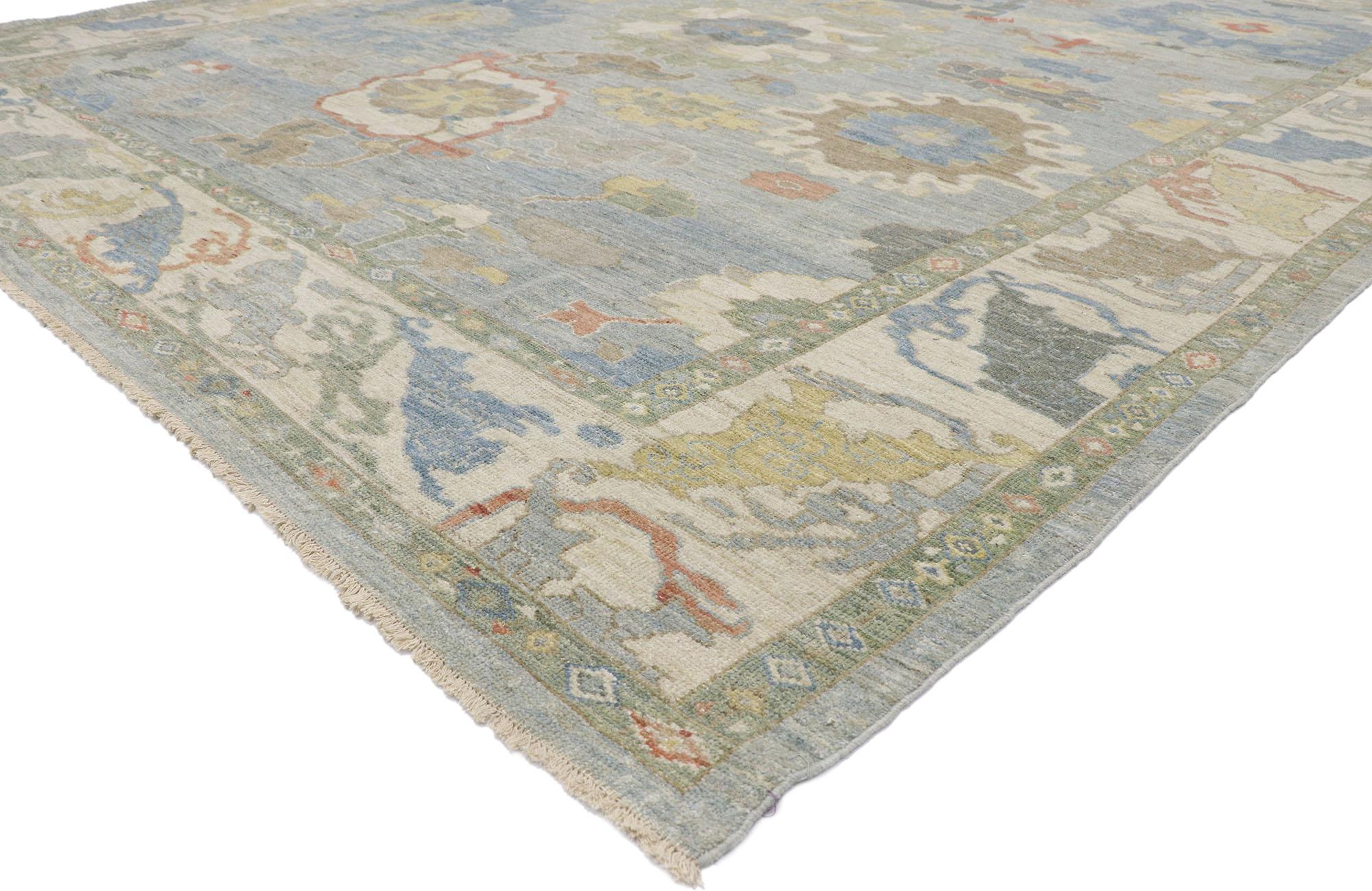 60862 New Contemporary Persian Sultanabad rug with Modern Coastal style 11'00 x 13'11. This hand-knotted wool contemporary Persian Sultanabad rug features an all-over botanical pattern spread across an abrashed bluish-grey field. An array of