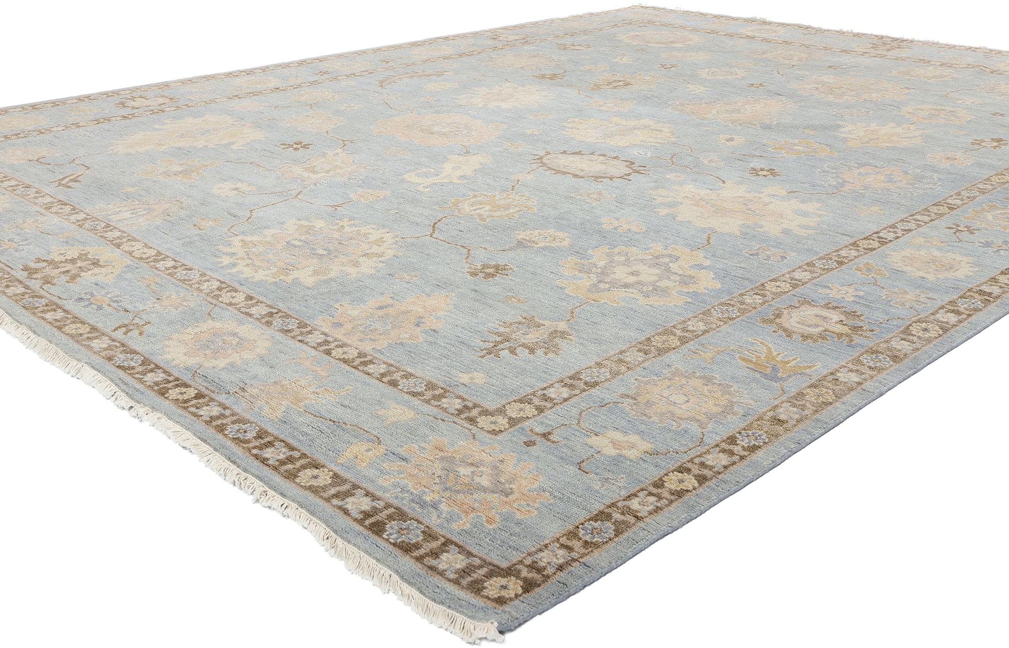 31060 Modern Earth-Tone Blue Oushak Rug, 09'03 x 11'10. This exquisite hand-knotted wool contemporary Oushak rug epitomizes the timeless beauty and sophisticated charm of traditional Oushak designs while embracing a modern color palette. The light