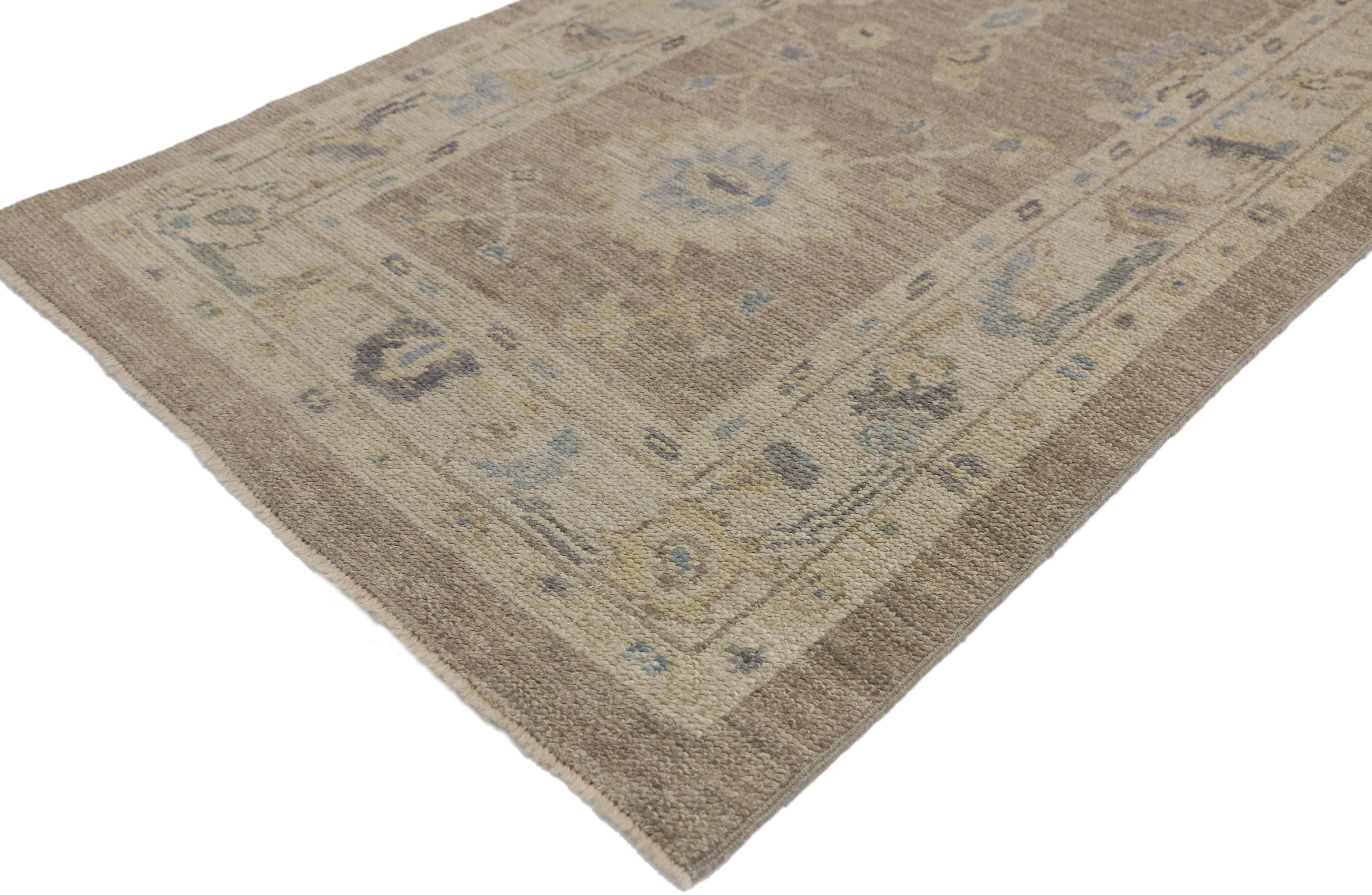 77317 New Turkish Oushak Hallway Runner with Transitional Style 02'09 x 11'07. This hand knotted wool transitional style Turkish Oushak runner features a geometric pattern composed of Harshang-style motifs, blooming palmettes, stylized flowers,