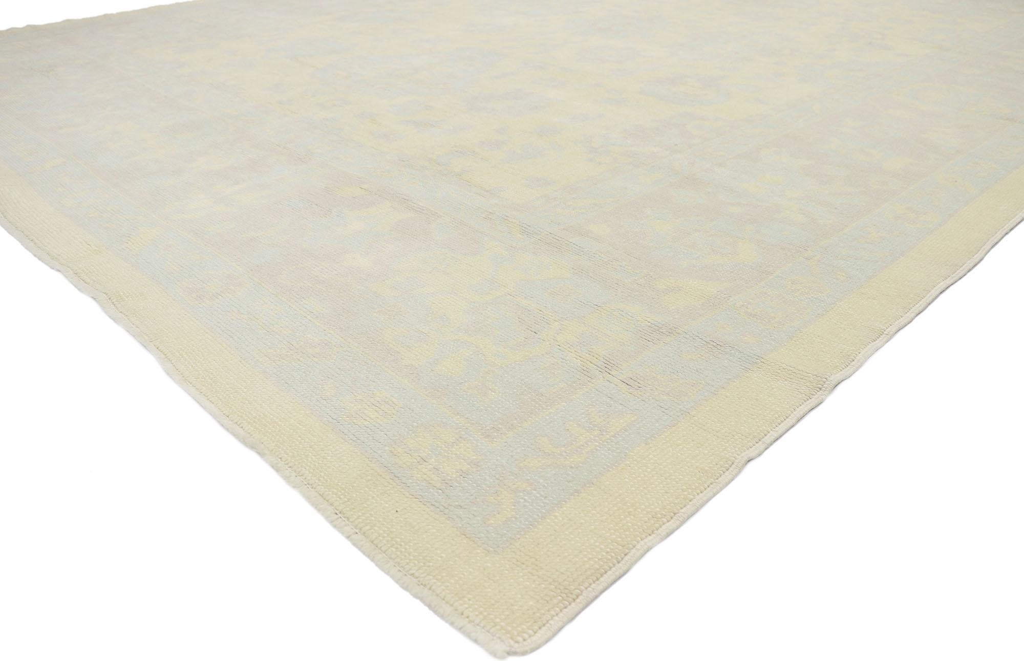 53156, Muted Pastel Turkish Oushak Rug. Blending elements from the modern world with pastel colors, this hand knotted wool contemporary Turkish Oushak rug will boost the coziness factor in nearly any space. The geometric print and warm hues woven