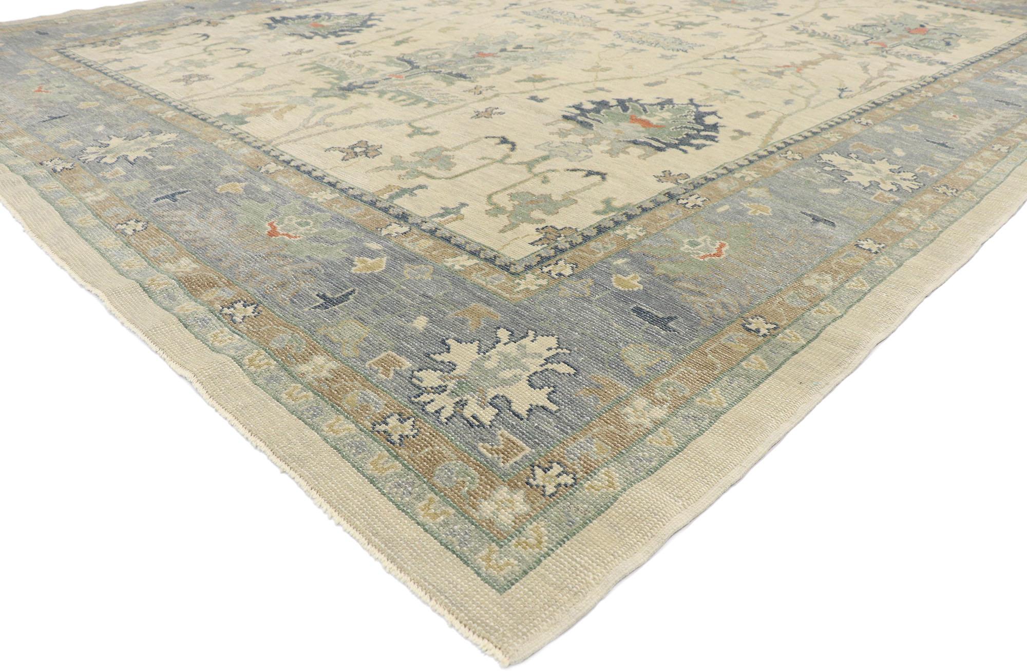 53492 New contemporary Turkish Oushak rug with Modern Coastal style. This hand-knotted wool contemporary Turkish Oushak rug features an all-over botanical pattern spread across an abrashed sandy-beige field. An array of botanical motifs decorates